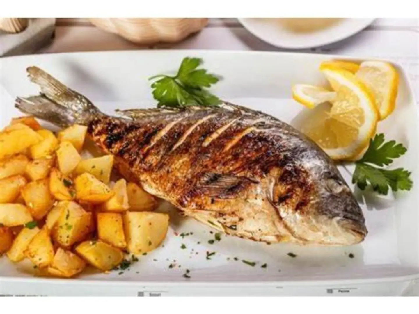 دنيس مشوي على الفحم مع رز