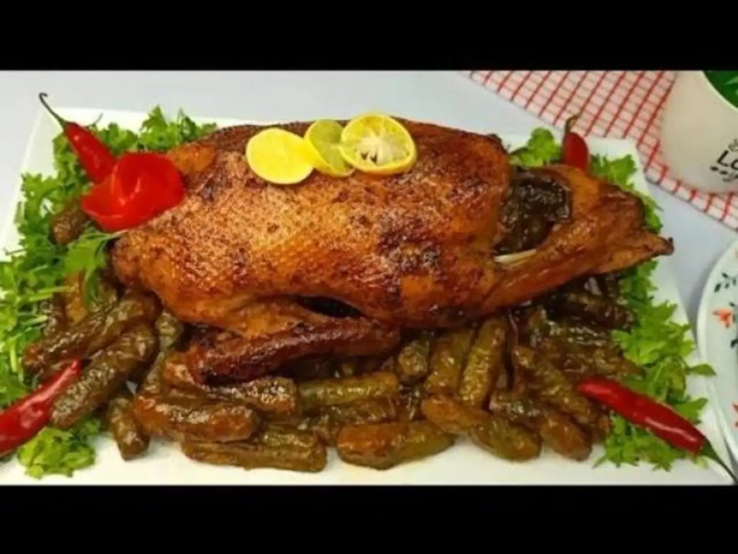 A Quarter Of A Duck With Grape Leaves