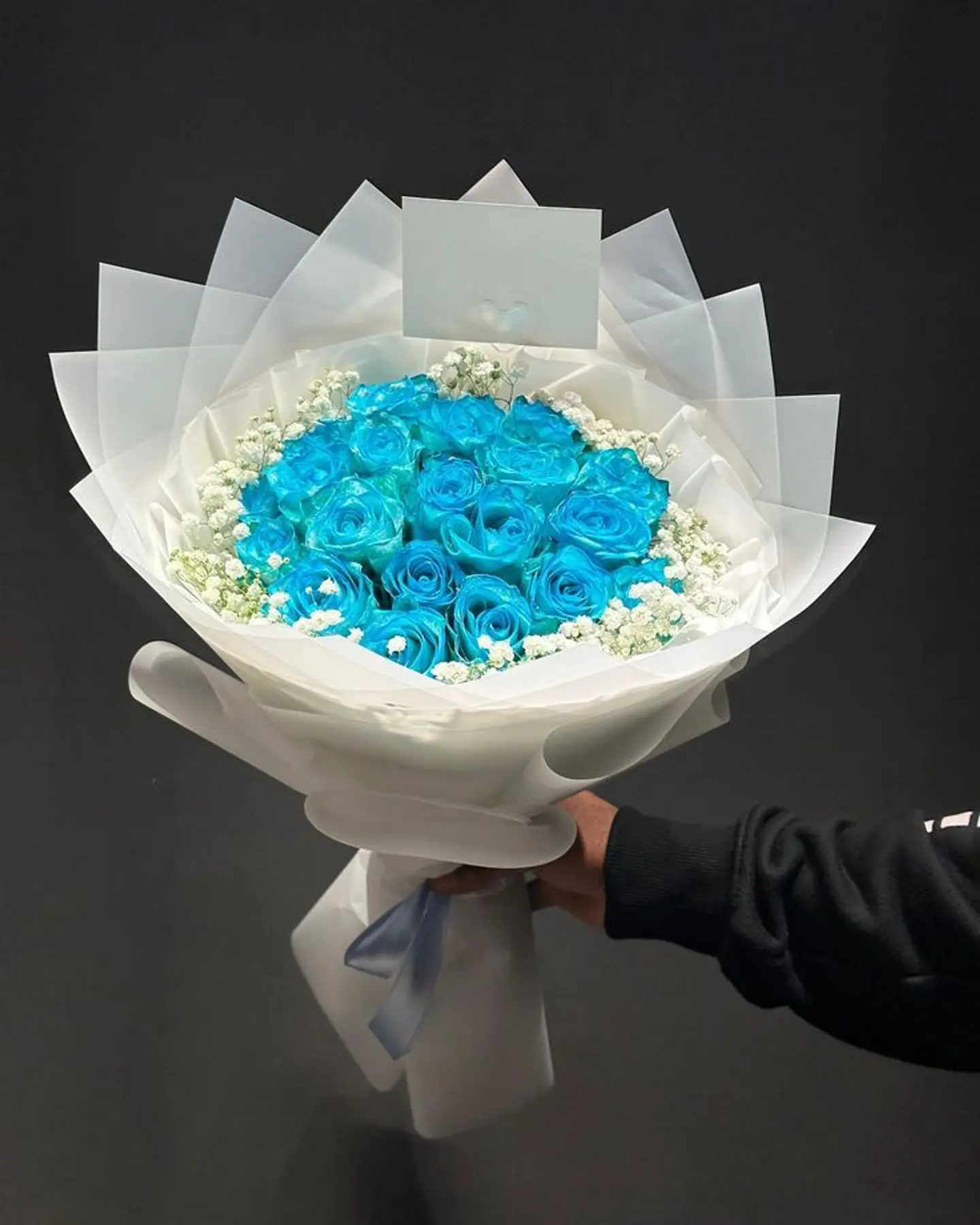 A Bouquet Of Flowers In A Sky Color