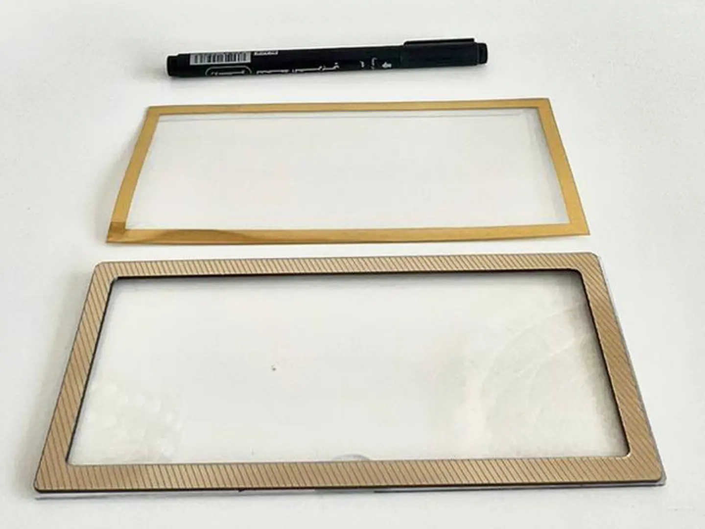 One Acrylic Envelope With A Golden Frame
