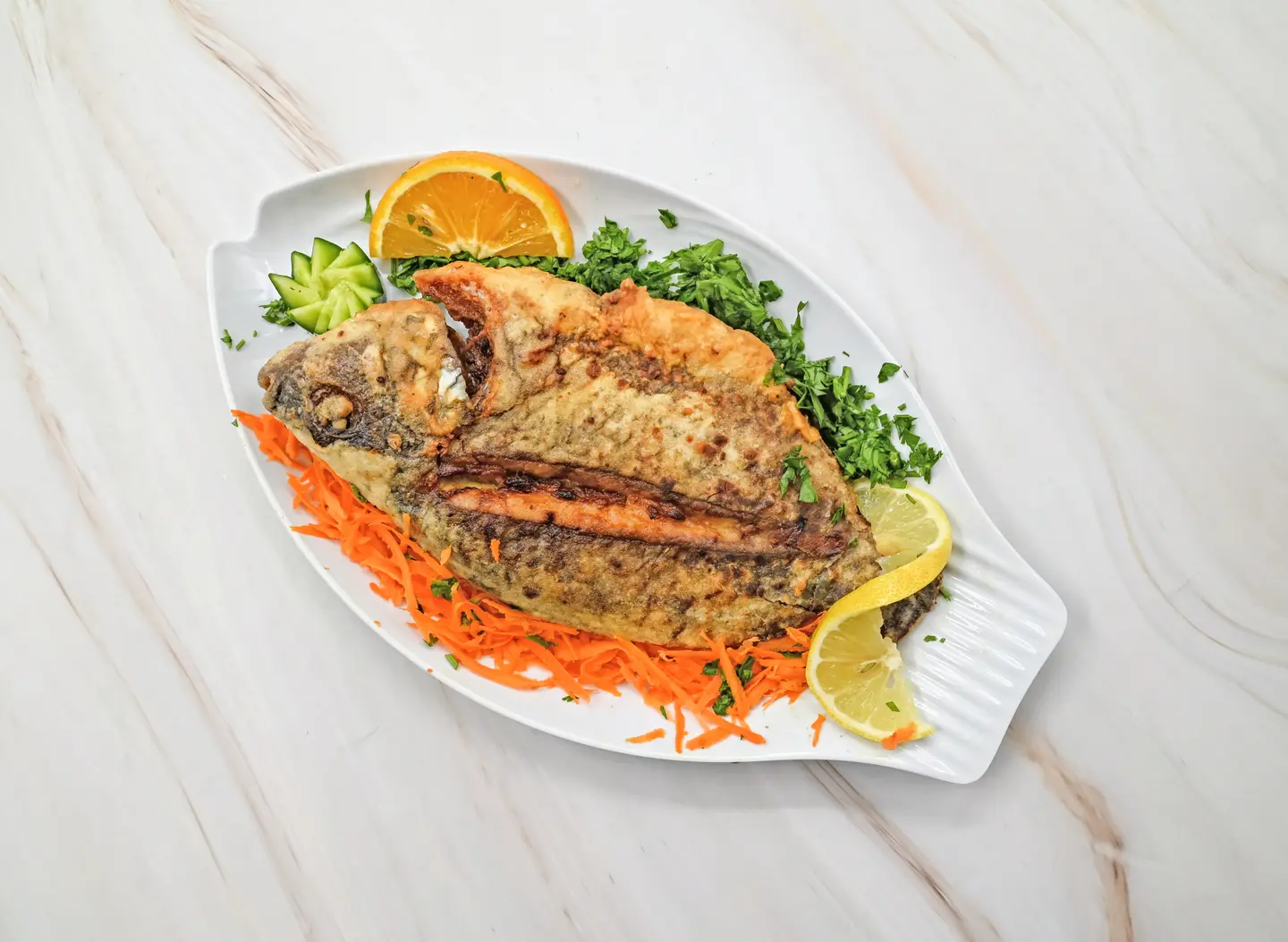 سمك بلطي مع ارز و سلطة