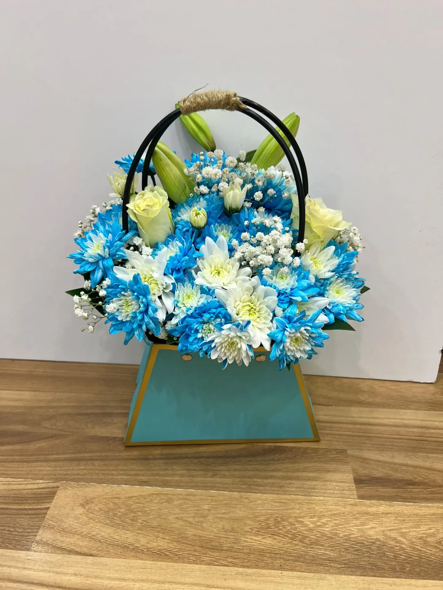 A Basket Of Blue And White Flowers