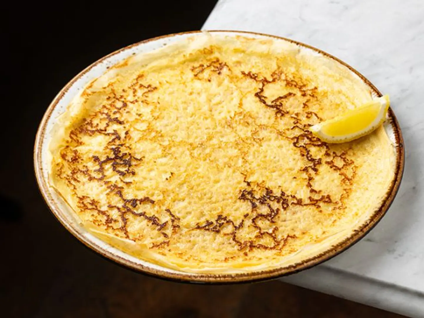 House Made Crepe With Lemon & Sugar