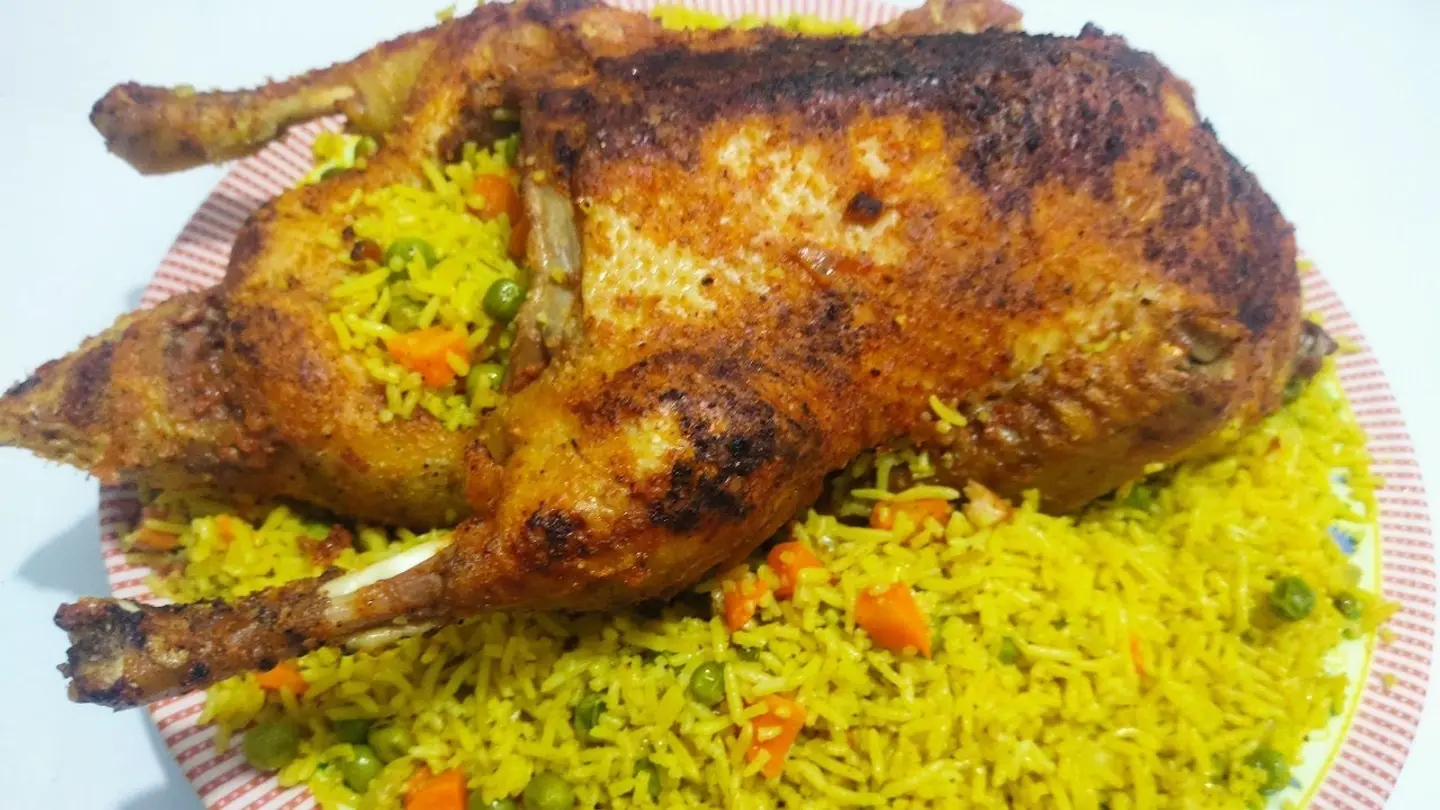 ربع بط مع أرز وخضار