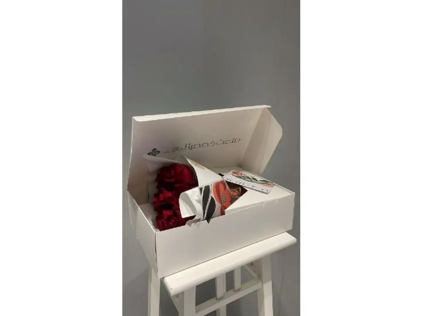 Box Contains 10 Rose Stems With Elegant Wrapping Inside A Custom Made Box With A Greeting Card