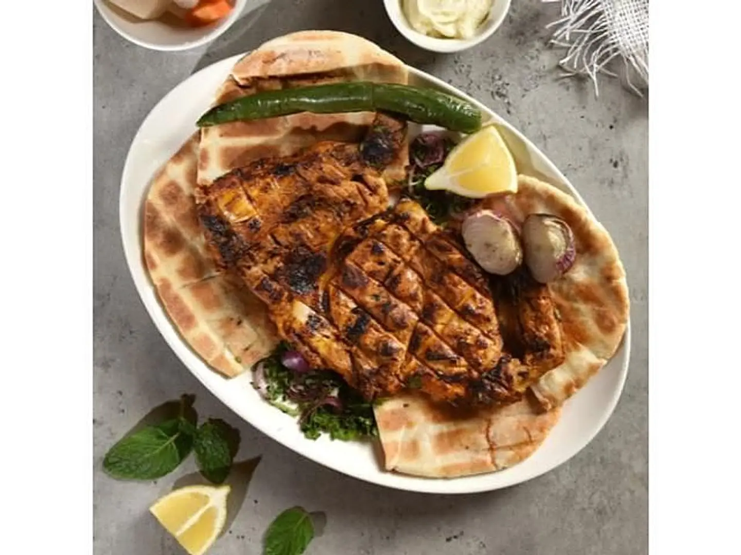 نصف فروج مشوي على الفحم