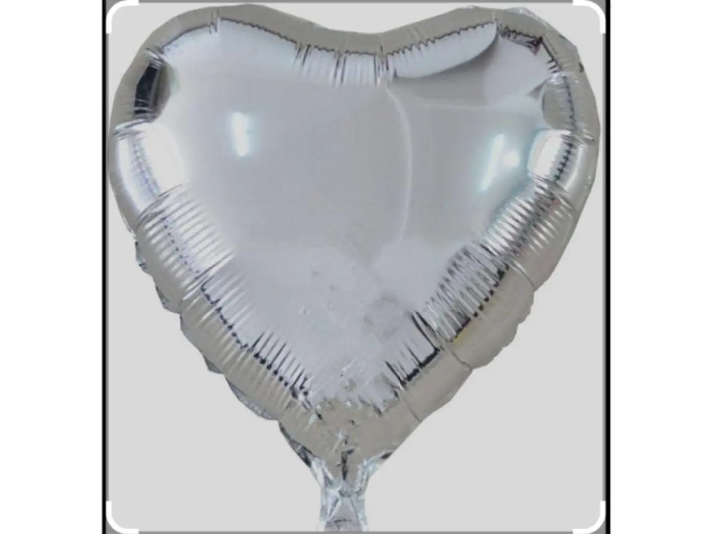 بالون قلب فضي
