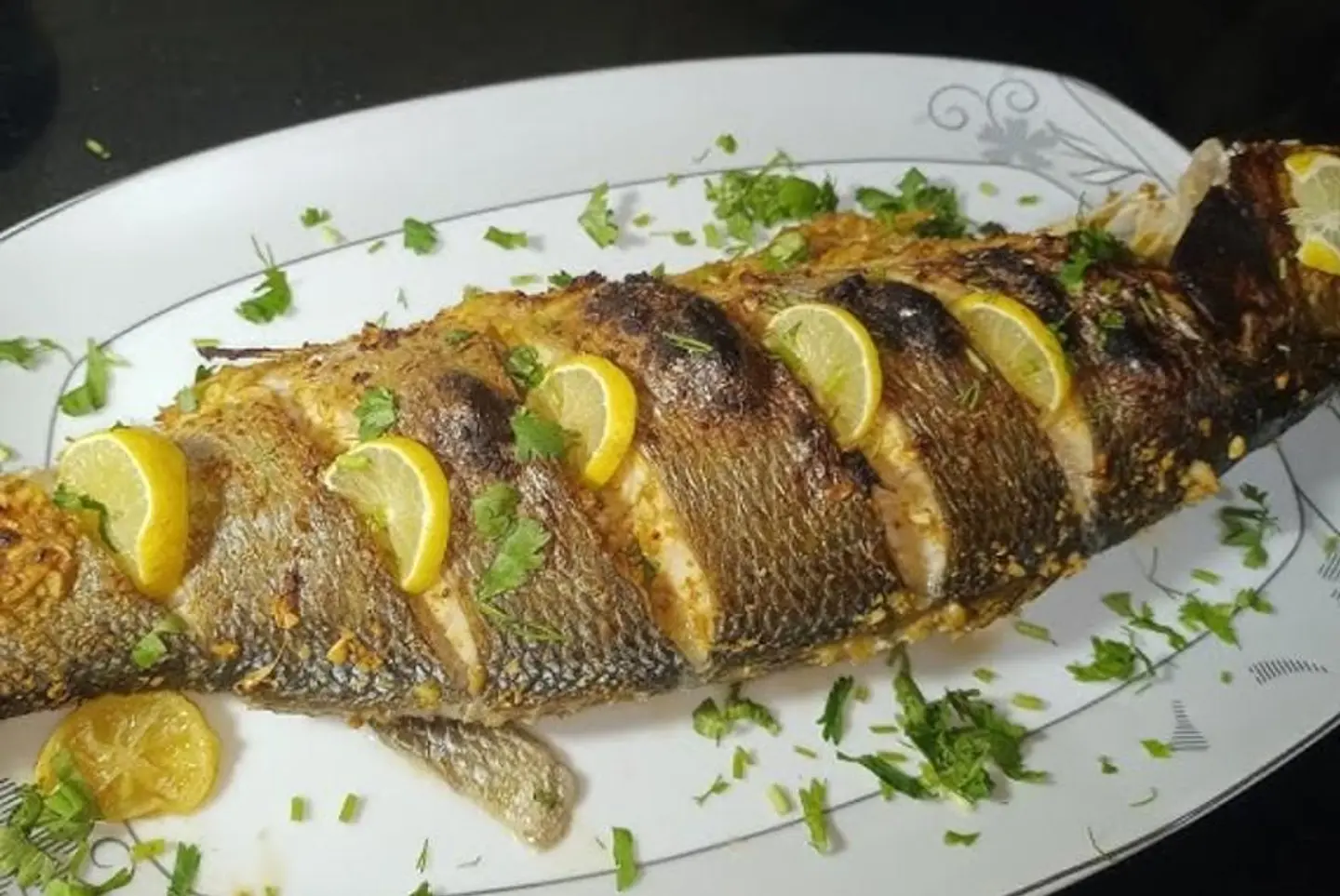 Bass Fish With Oil And Lemon