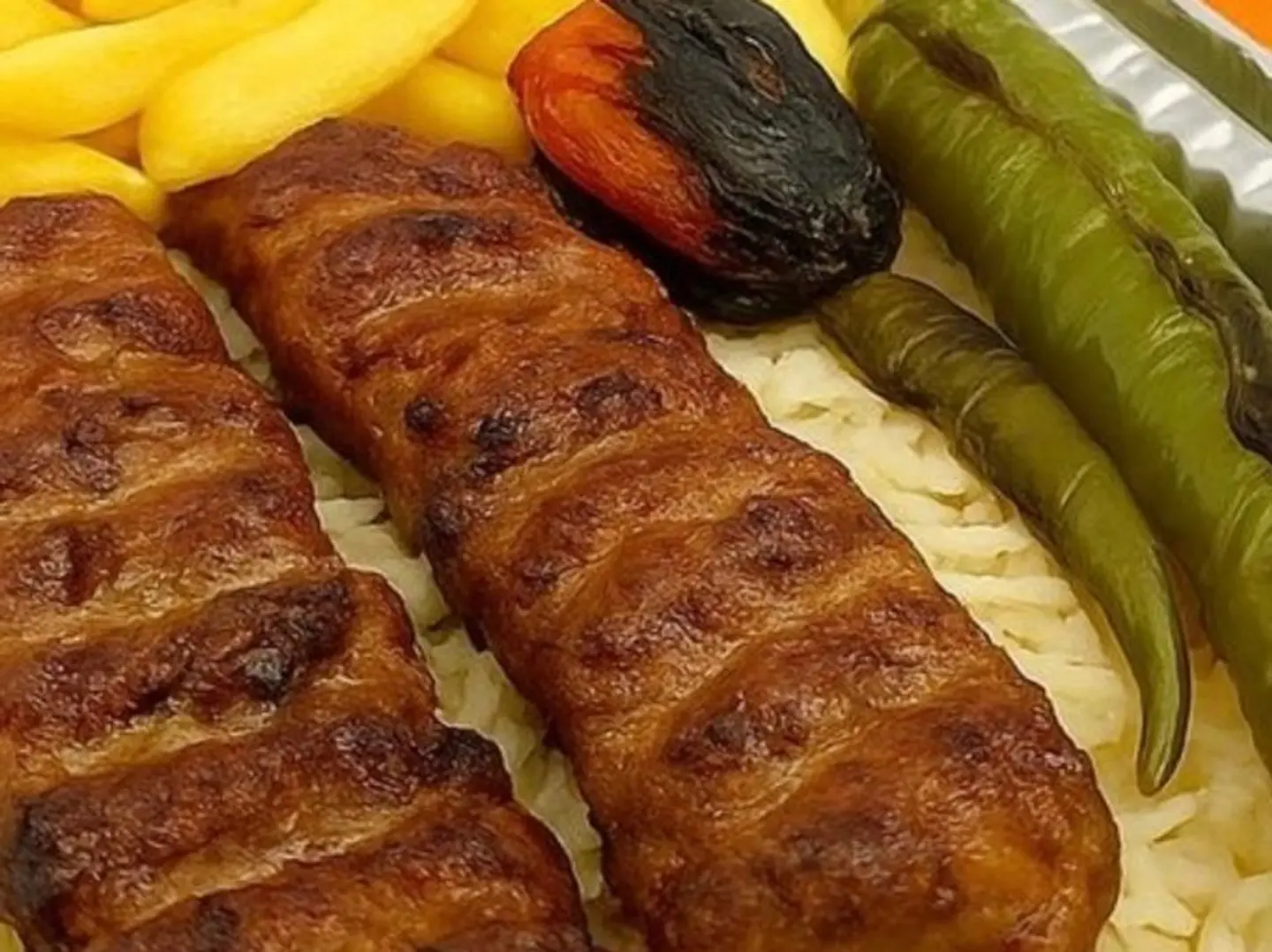 Plate Of 2 Lamb Kebab Skewers With Rice