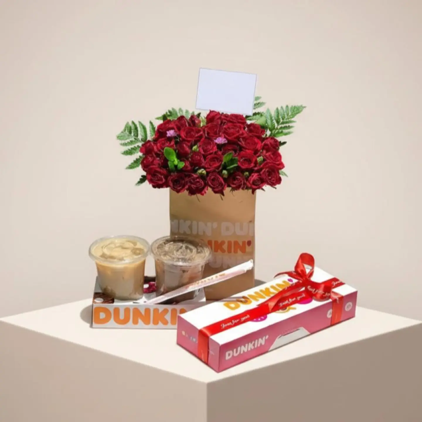 A Luxurious Arrangement Of Roses With Coffee