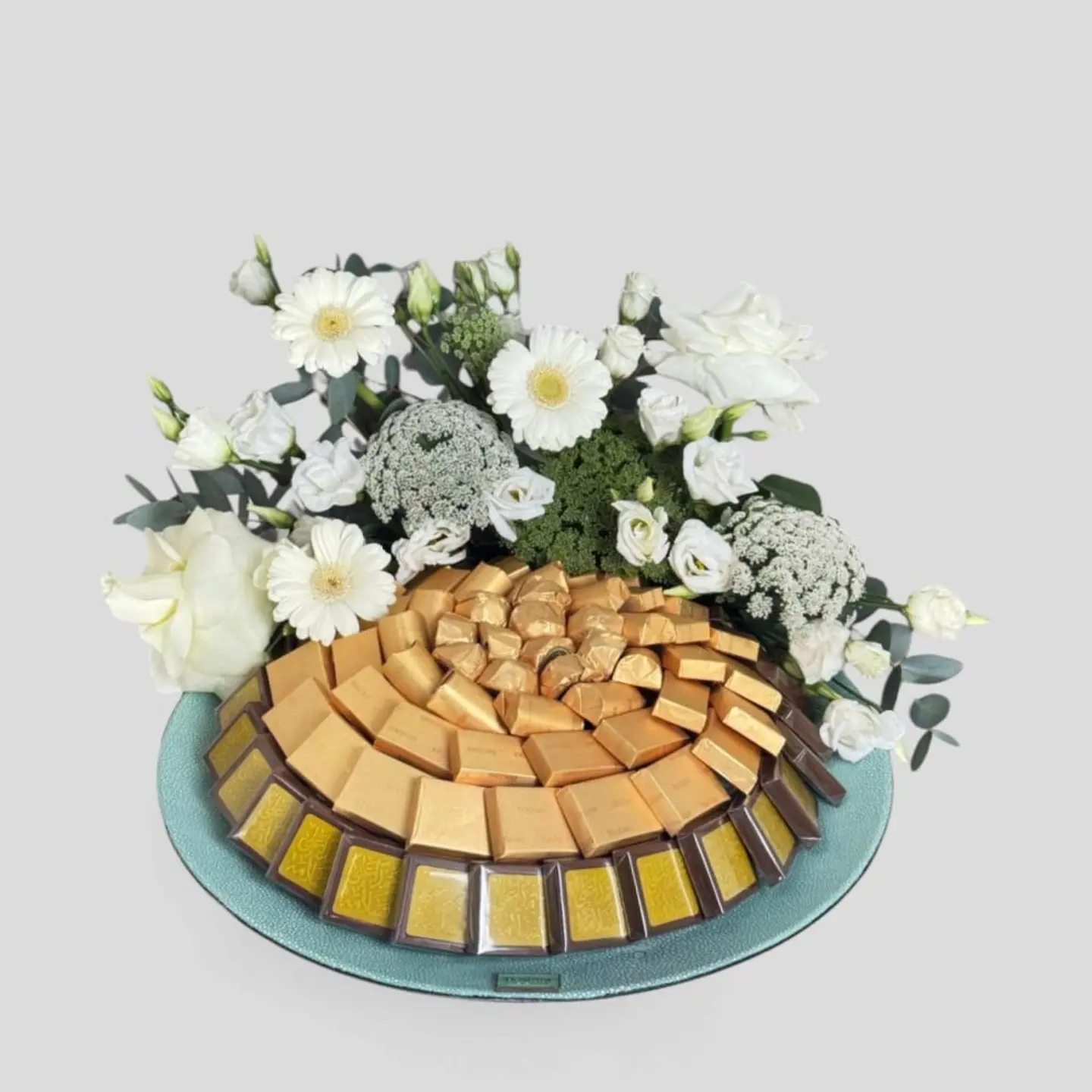 Arrangement Of A Chocolate Tray With Flowers