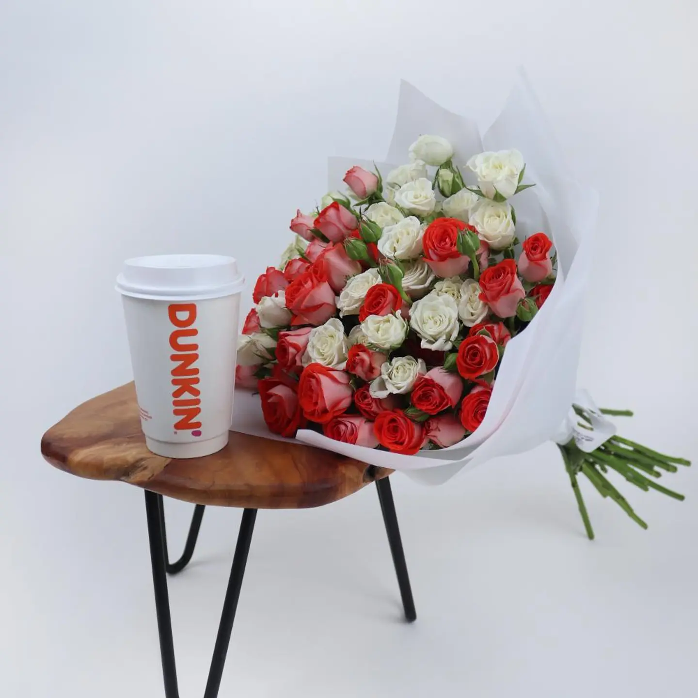 A Bouquet Of Roses With A Cup Of Coffee