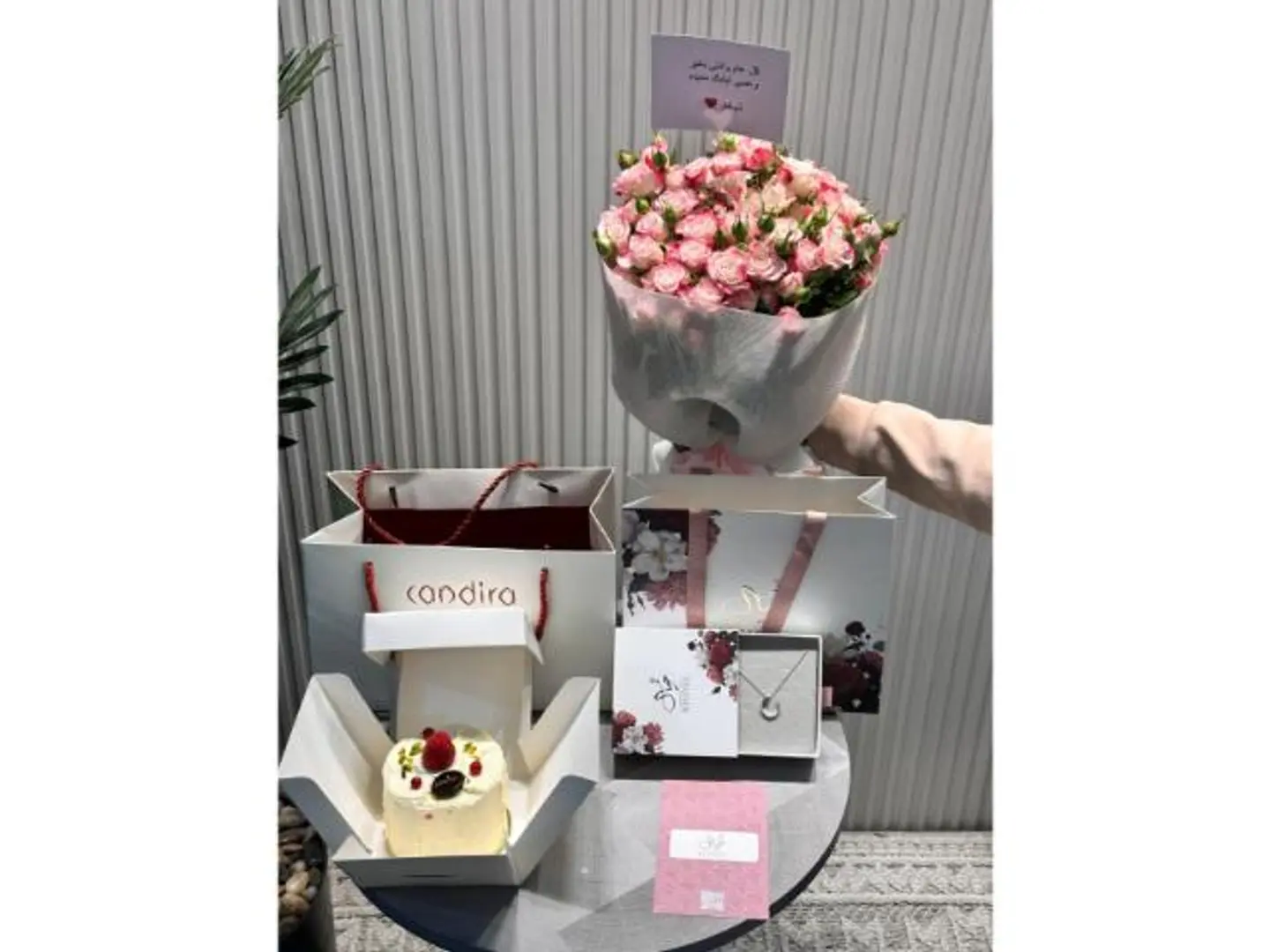 A Bouquet Of Roses With A Dream Necklace By Kendra