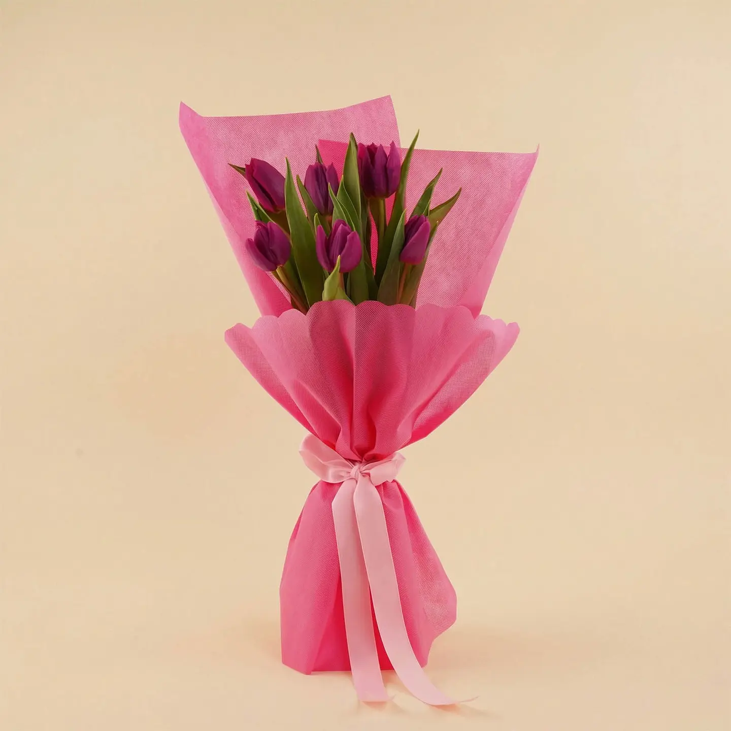 A Bouquet Of Purple Tulips As A Gift For Mom