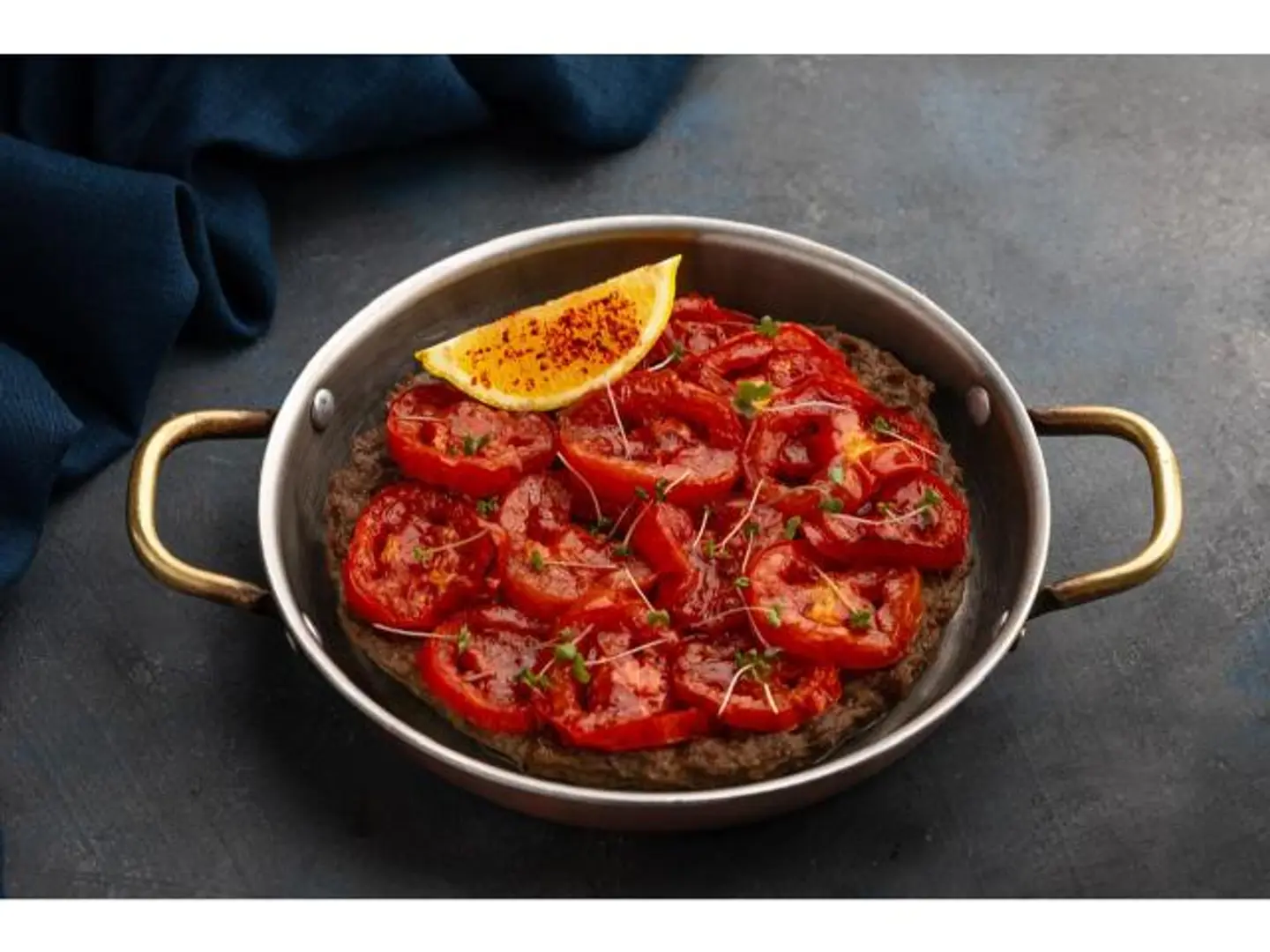 Meat With Tomatoes In A Tray