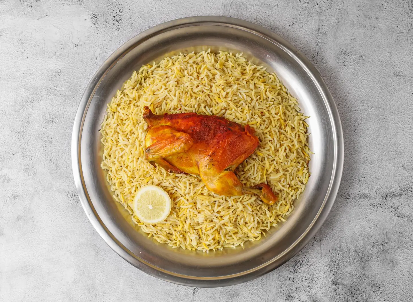 ربع دجاج مندي مع أرز مندي