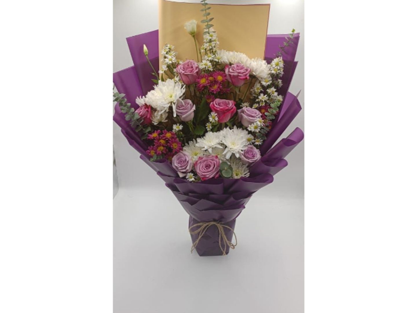 A Bouquet Of Purple Roses