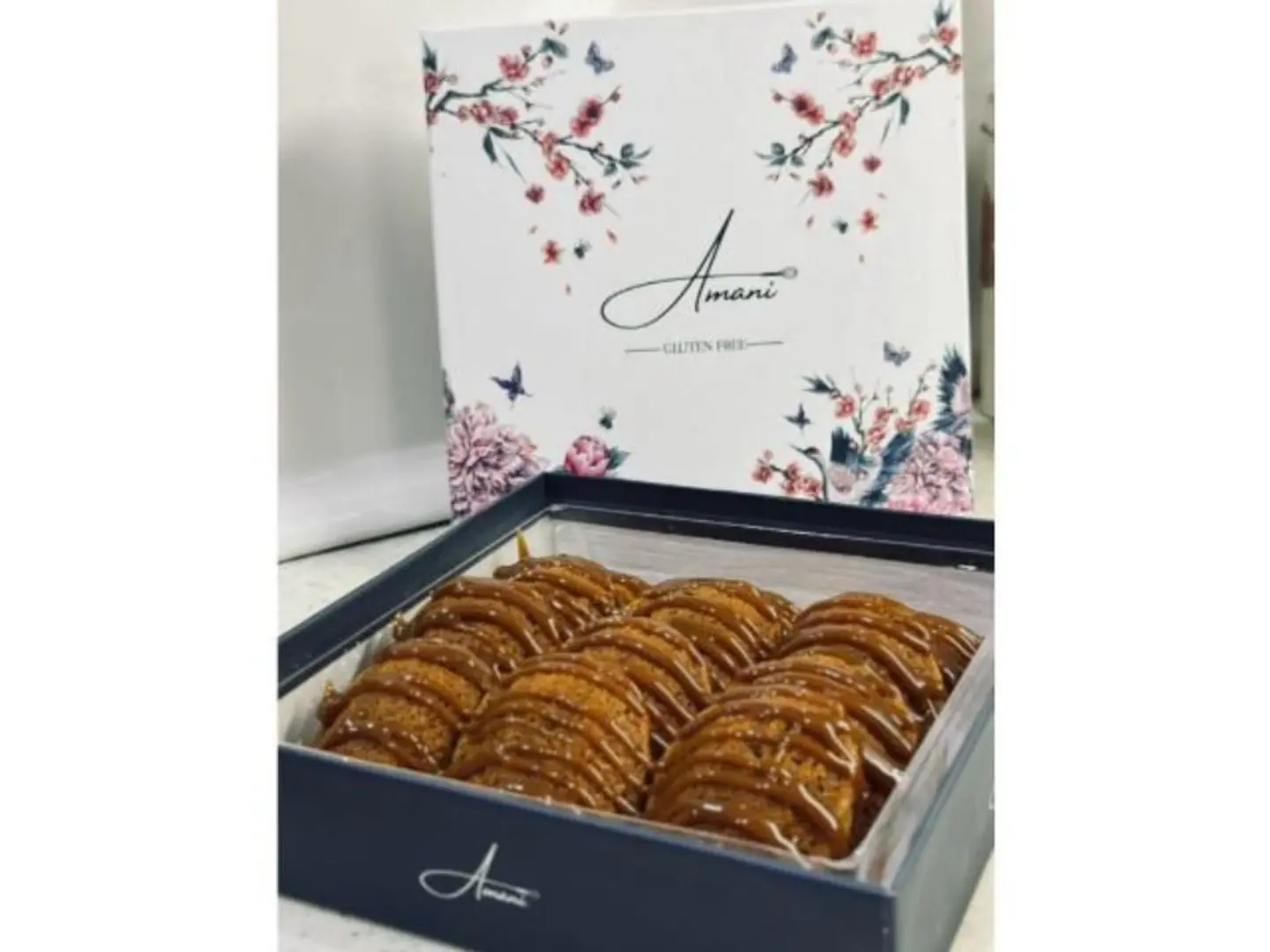 ﻣﺎدﻟﯾن اﻟﺗﻣر ﺑﺎﻟﻛراﻣﯾل ﺑوﻛس ﻣﻛون ﻣن ١٢