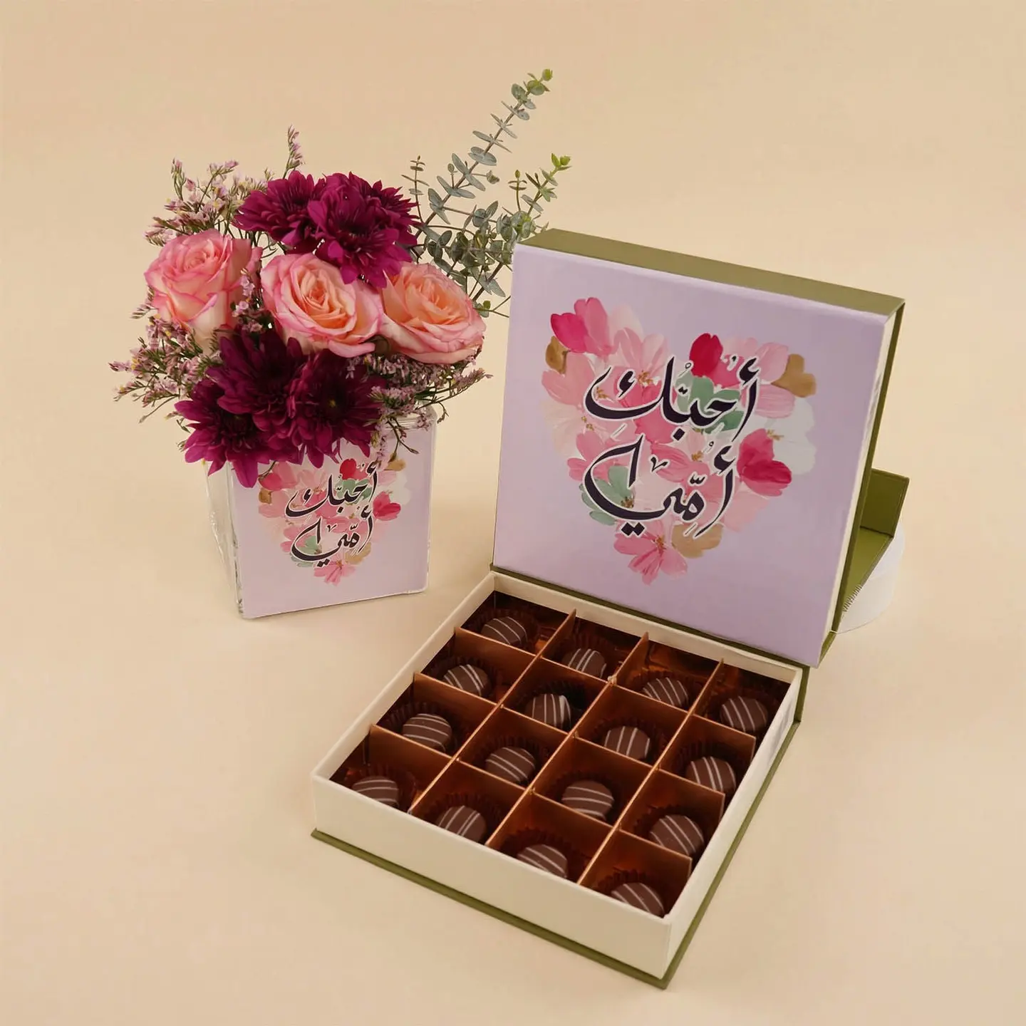 A Vase Of Roses And Chrysanthemums With Chocolates As A Gift For Mothers