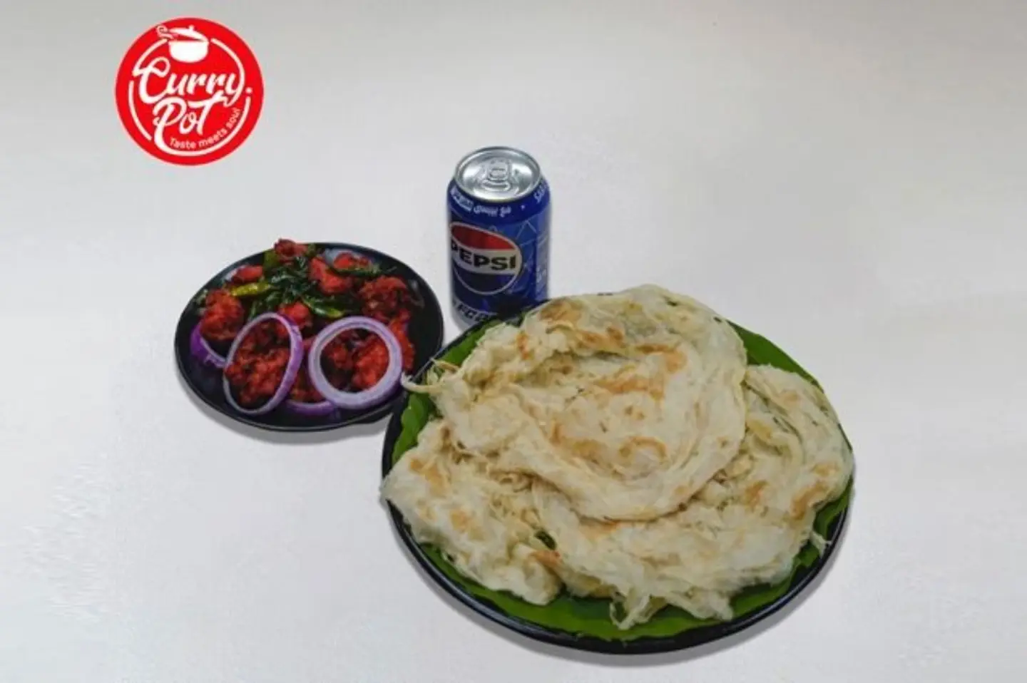 Porotta 3 Pcs + Chicken 65 + Pepsi