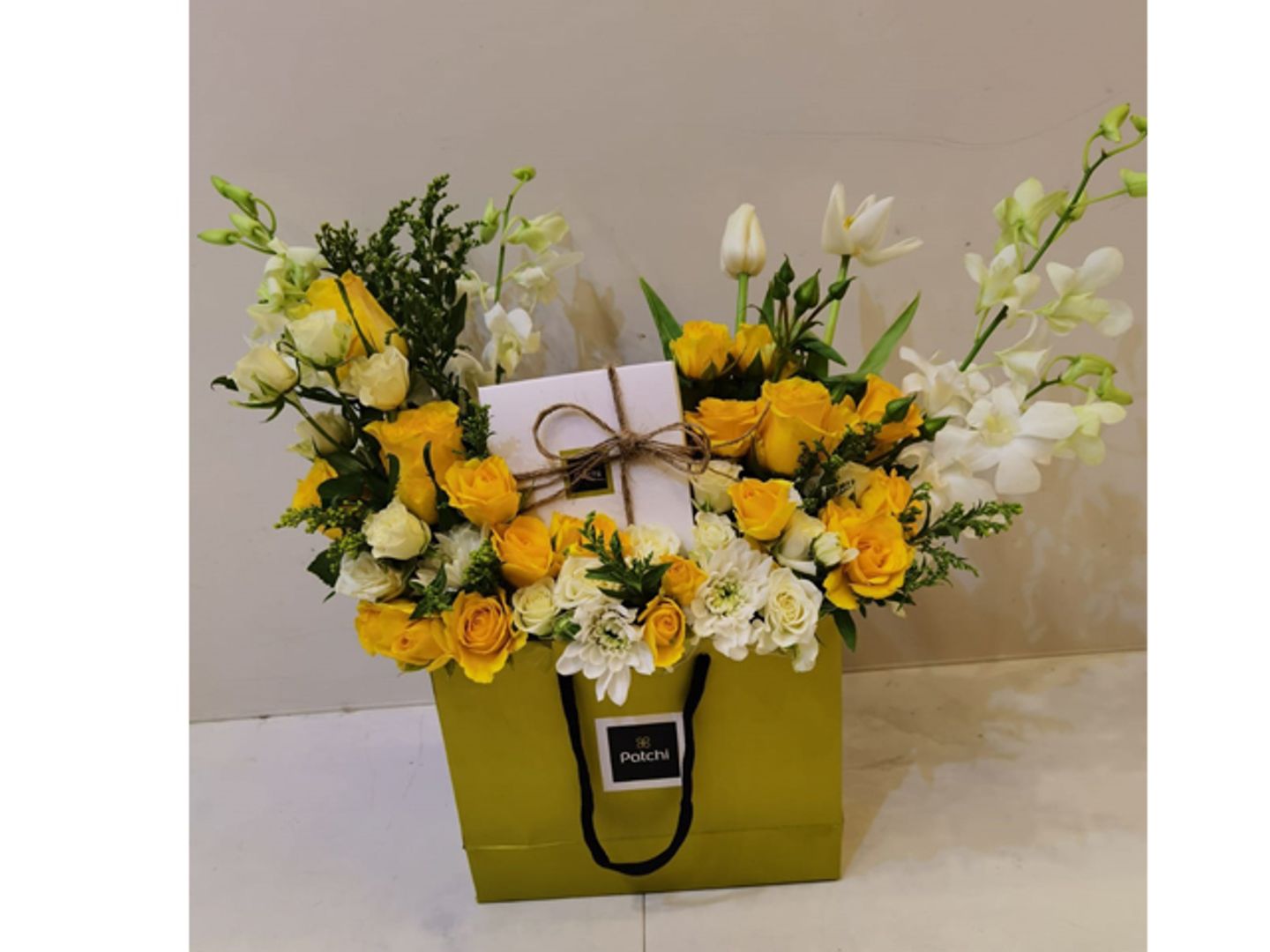 Quarter Kilo Of Patchi Chocolate With Natural Flowers Gh