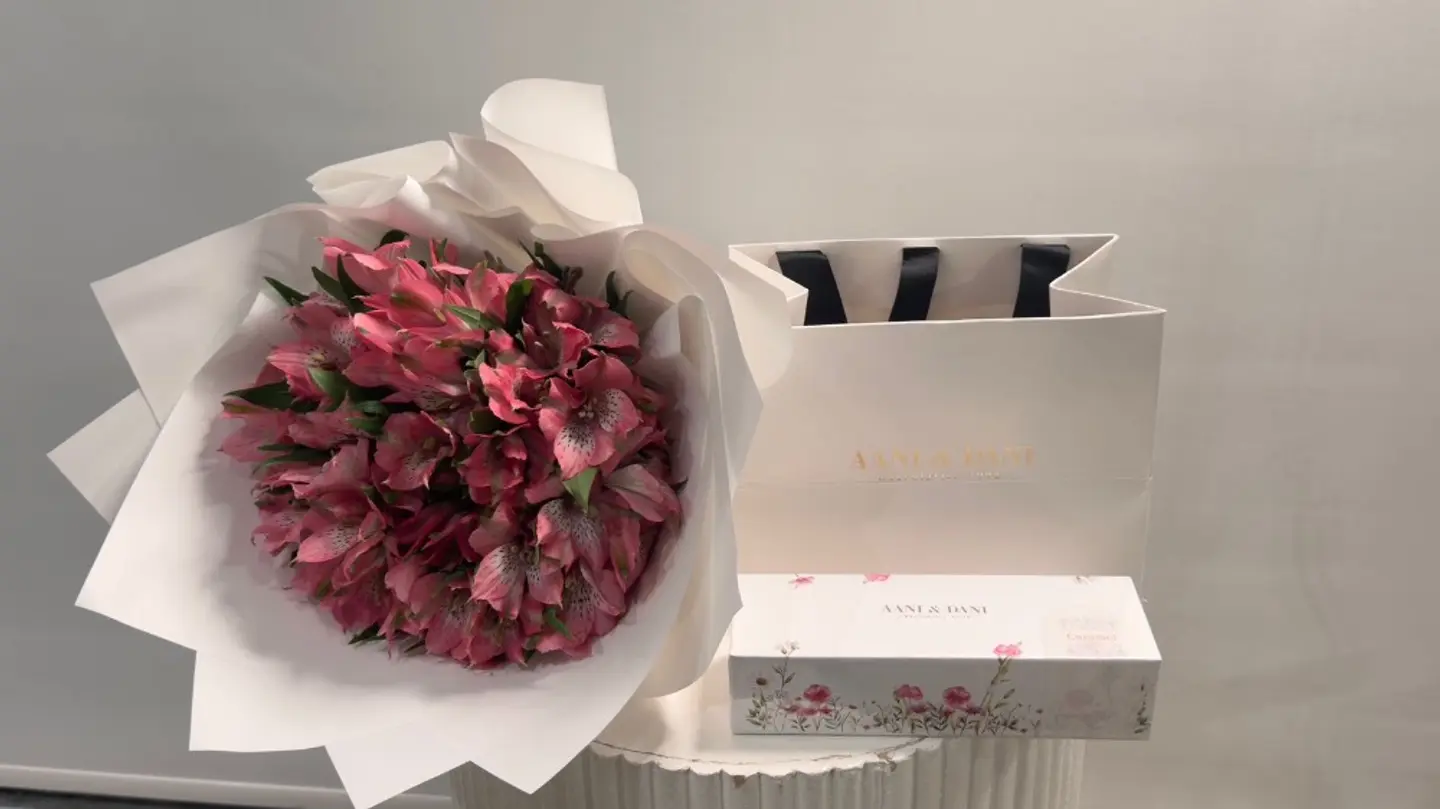 A Bouquet Of Satorium Roses With Chocolate, Anni And Dani