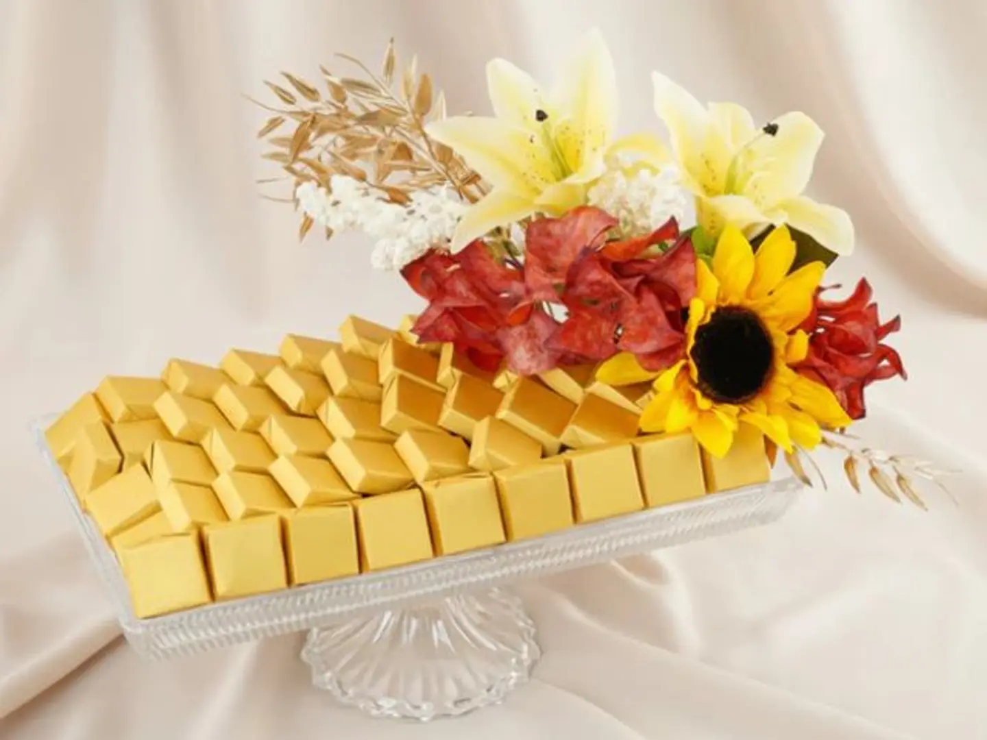 A Tray Of Roses And Golden Chocolates