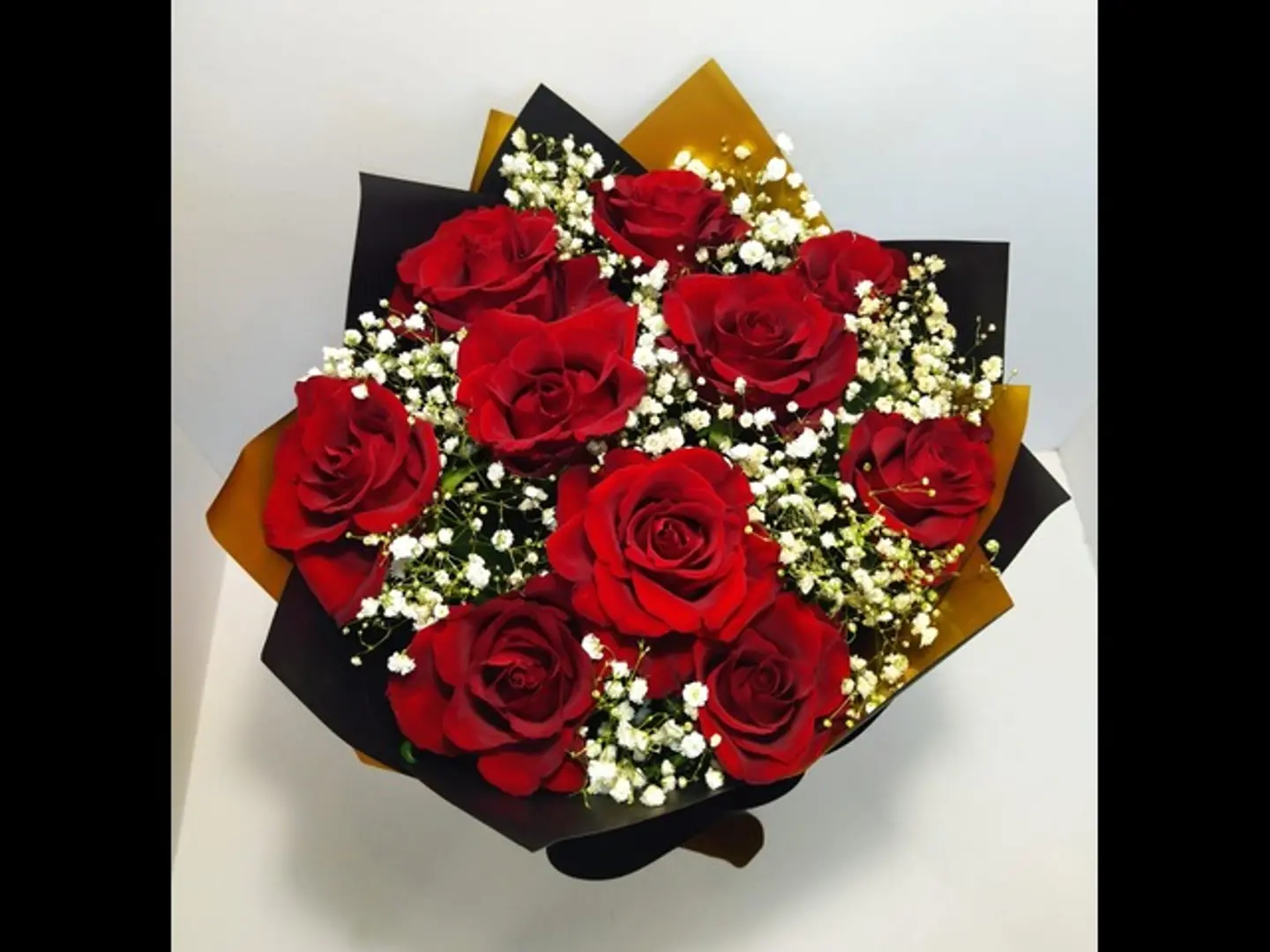 A Bouquet Of Red Roses, Black And Gold Wrapping
