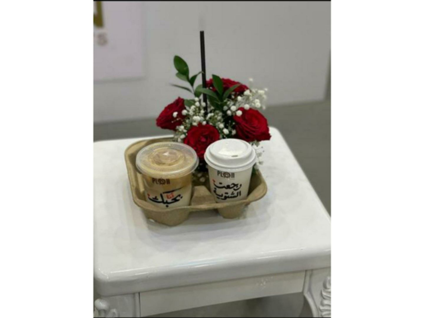 Two Cups Of Hot And Cold Coffee With Roses