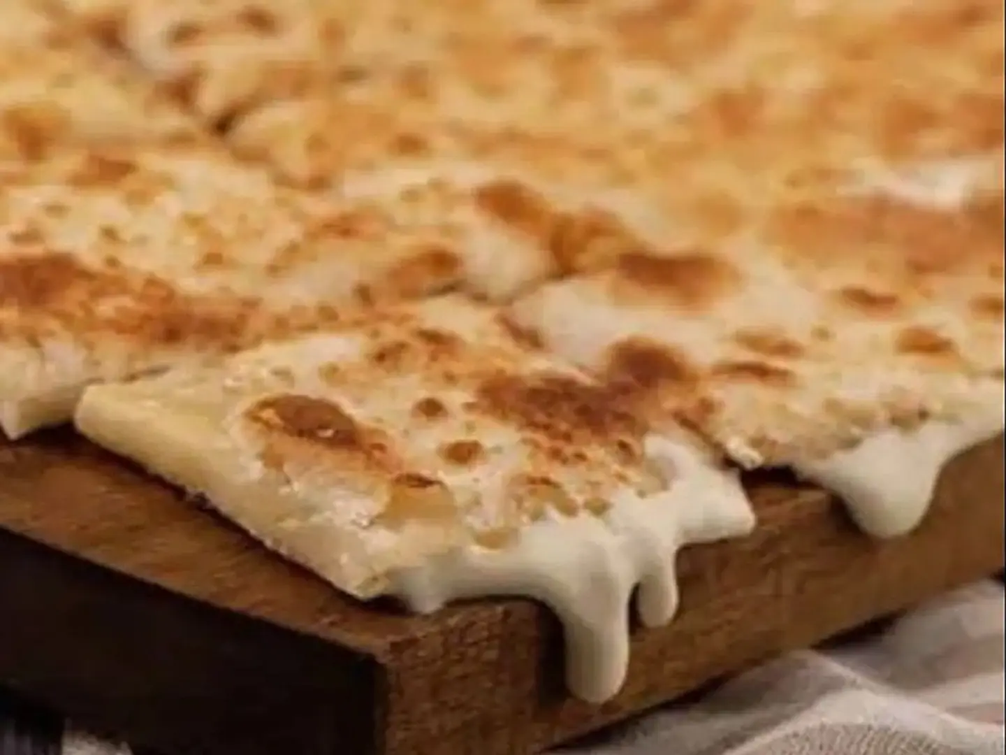 Oven Baked Mutabbaq With Liquid Cheese