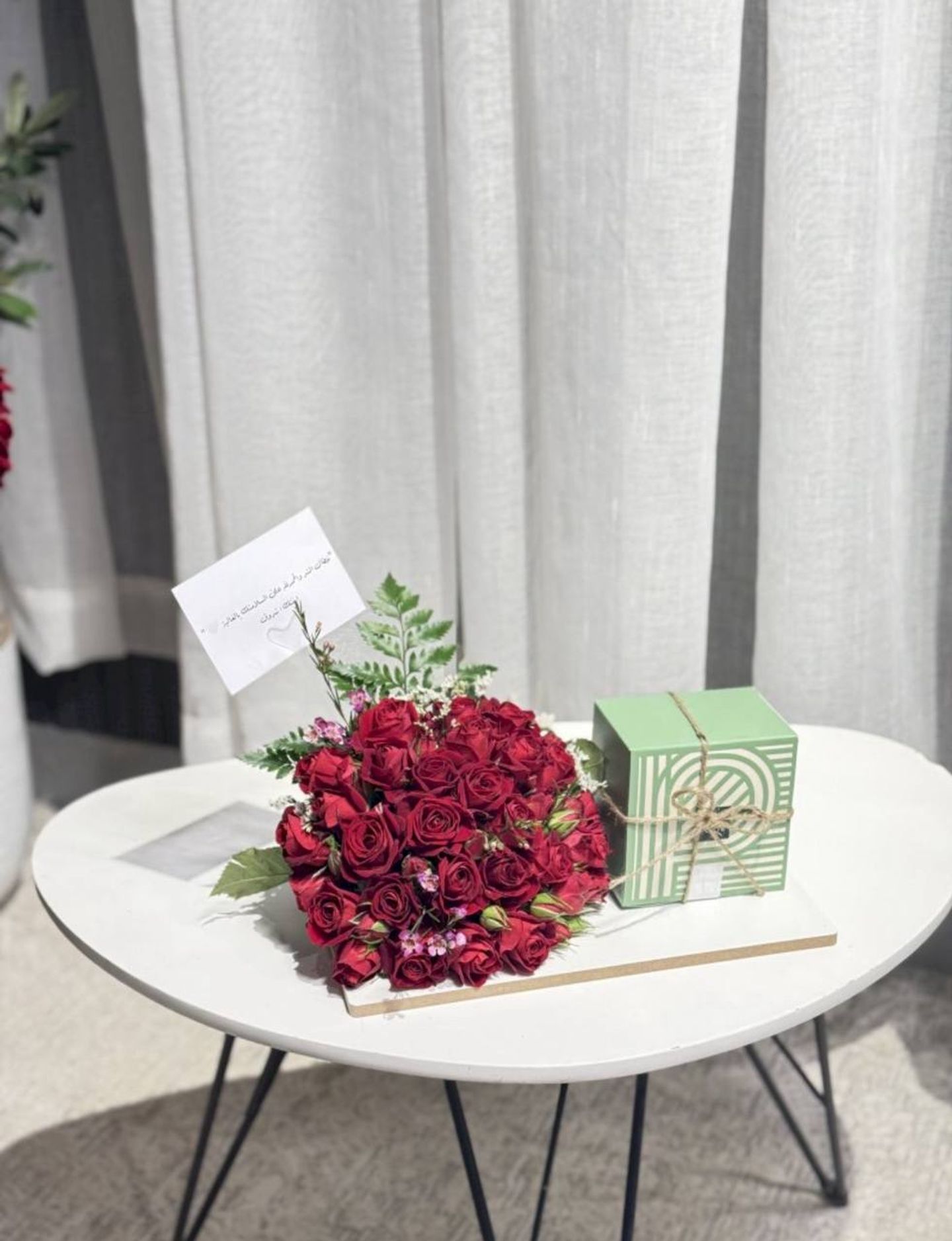 Patchi With Flower Arrangement On The Stand