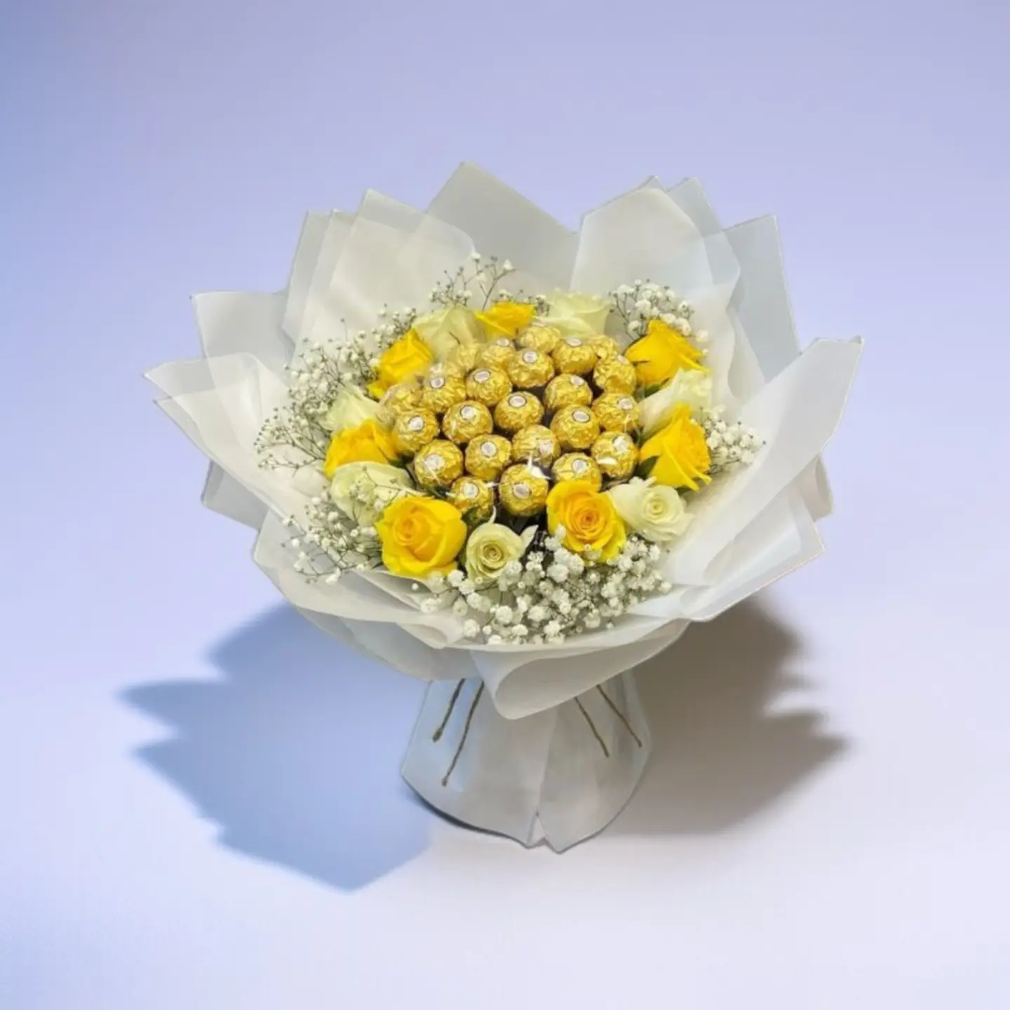 Bouquet Of Flowers And Chocolate With Elegant Wrapping