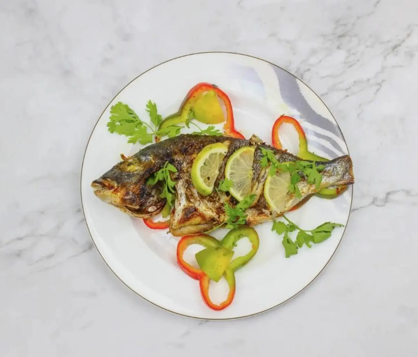 Tilapia Fish With Oil And Lemon