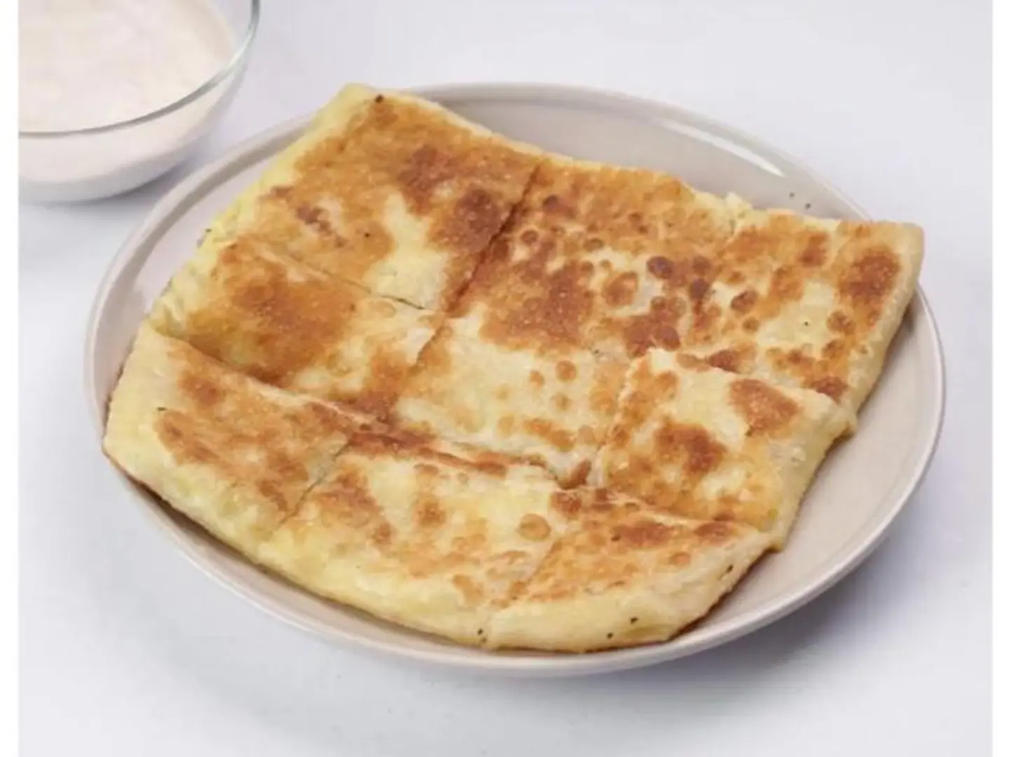 مطبق بالقشطة