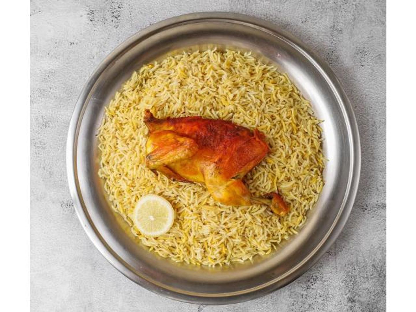 نص حبة دجاج مندي مع الارز
