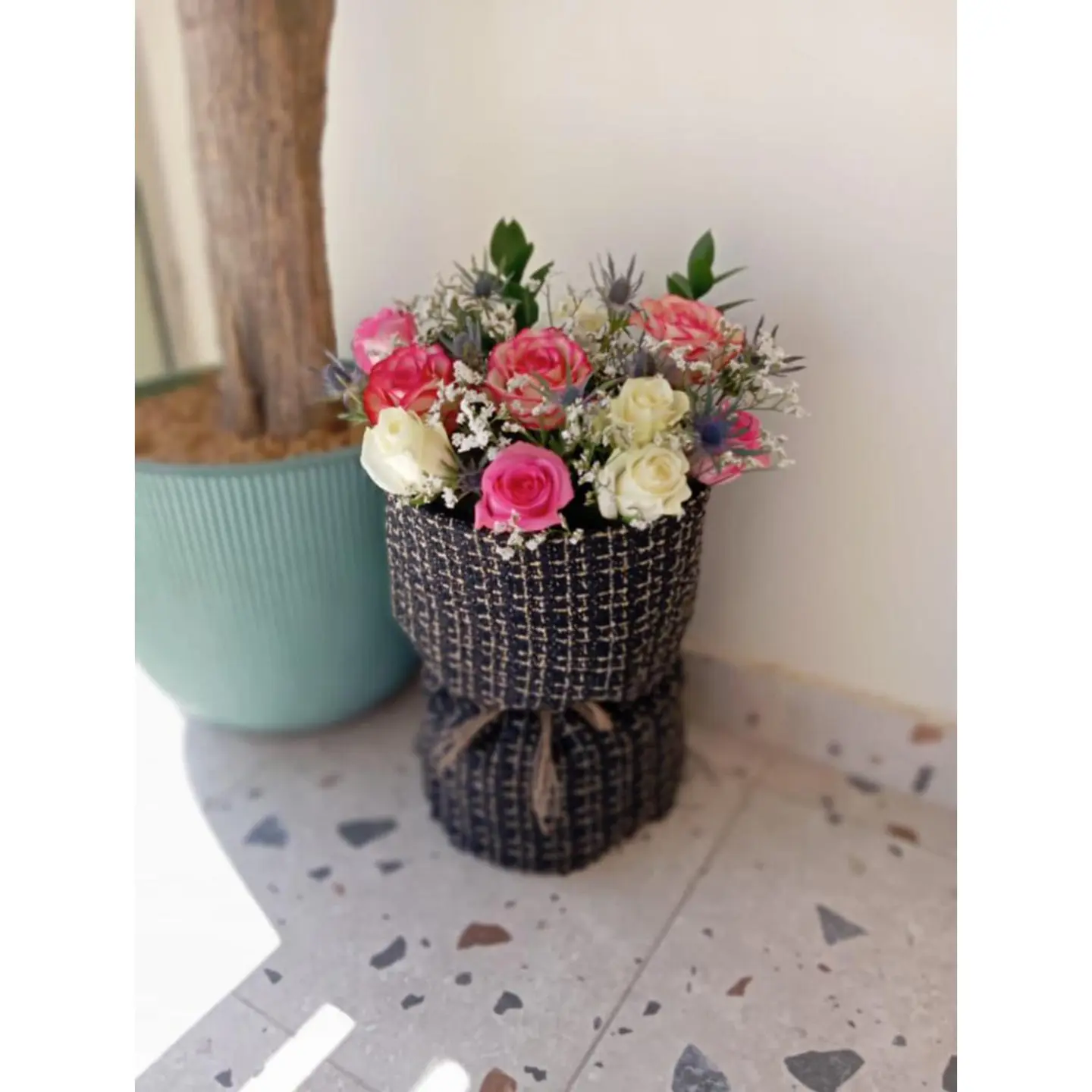 A Bouquet Of Roses Decorated With Fabric Wrapping B27