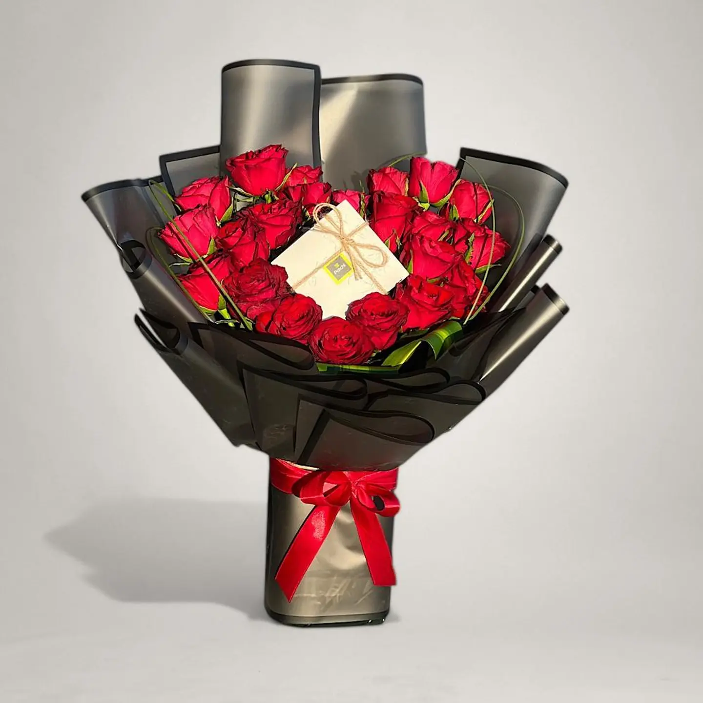 A Bouquet Of Roses With Patchi