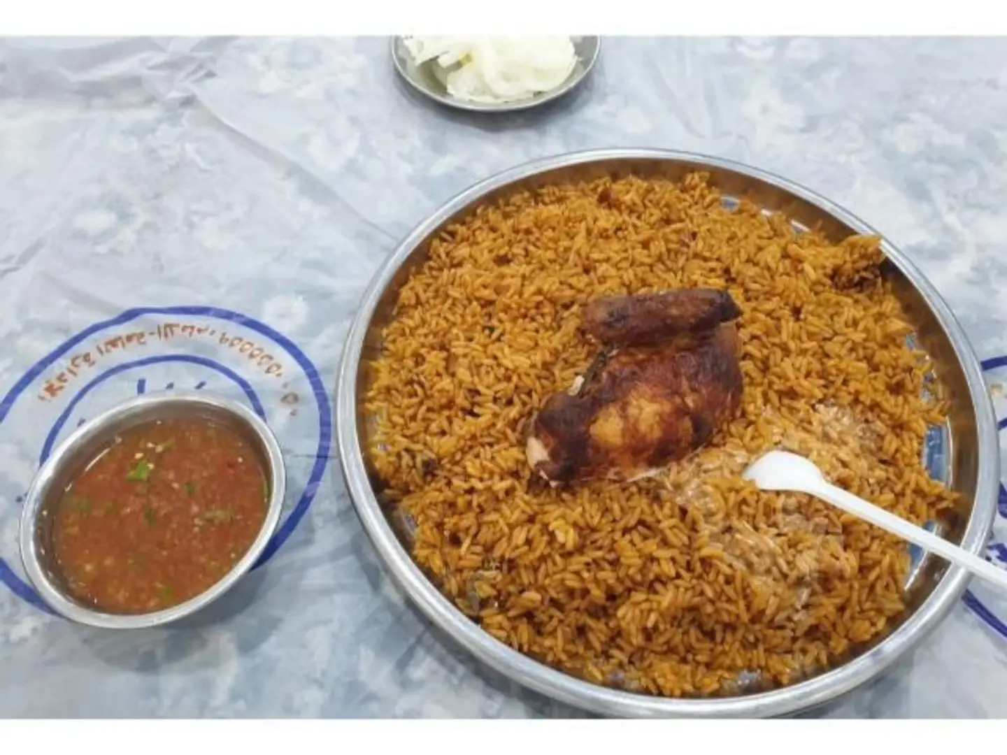 A Quarter On Charcoal With Rice Breast