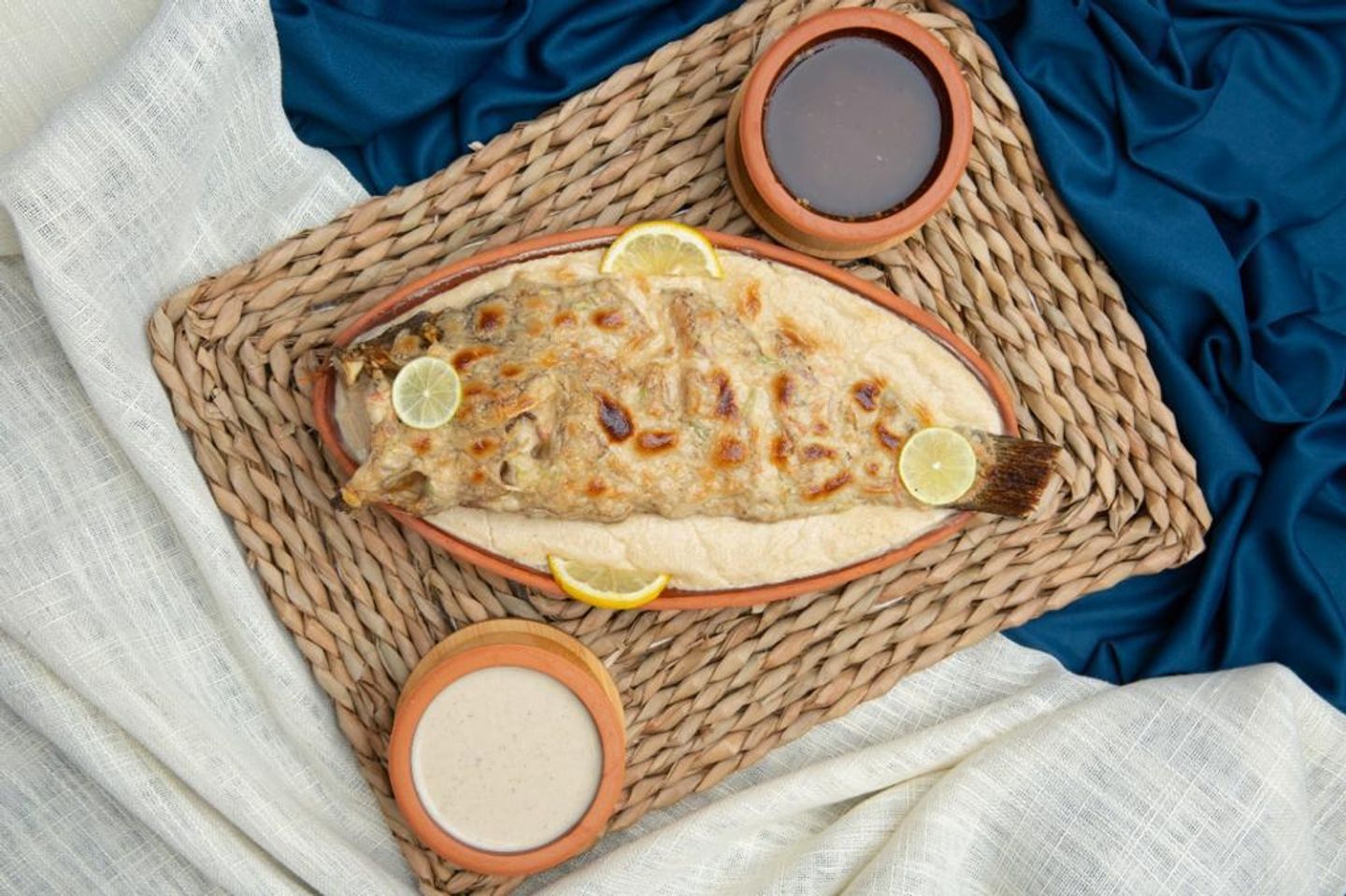 طاجن سمك هامور بالطحينية