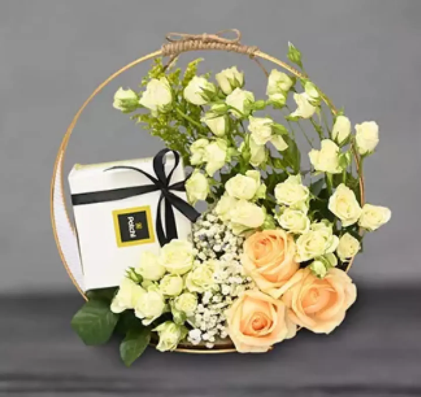 Assorted Roses And Chocolates In A Varied Frame