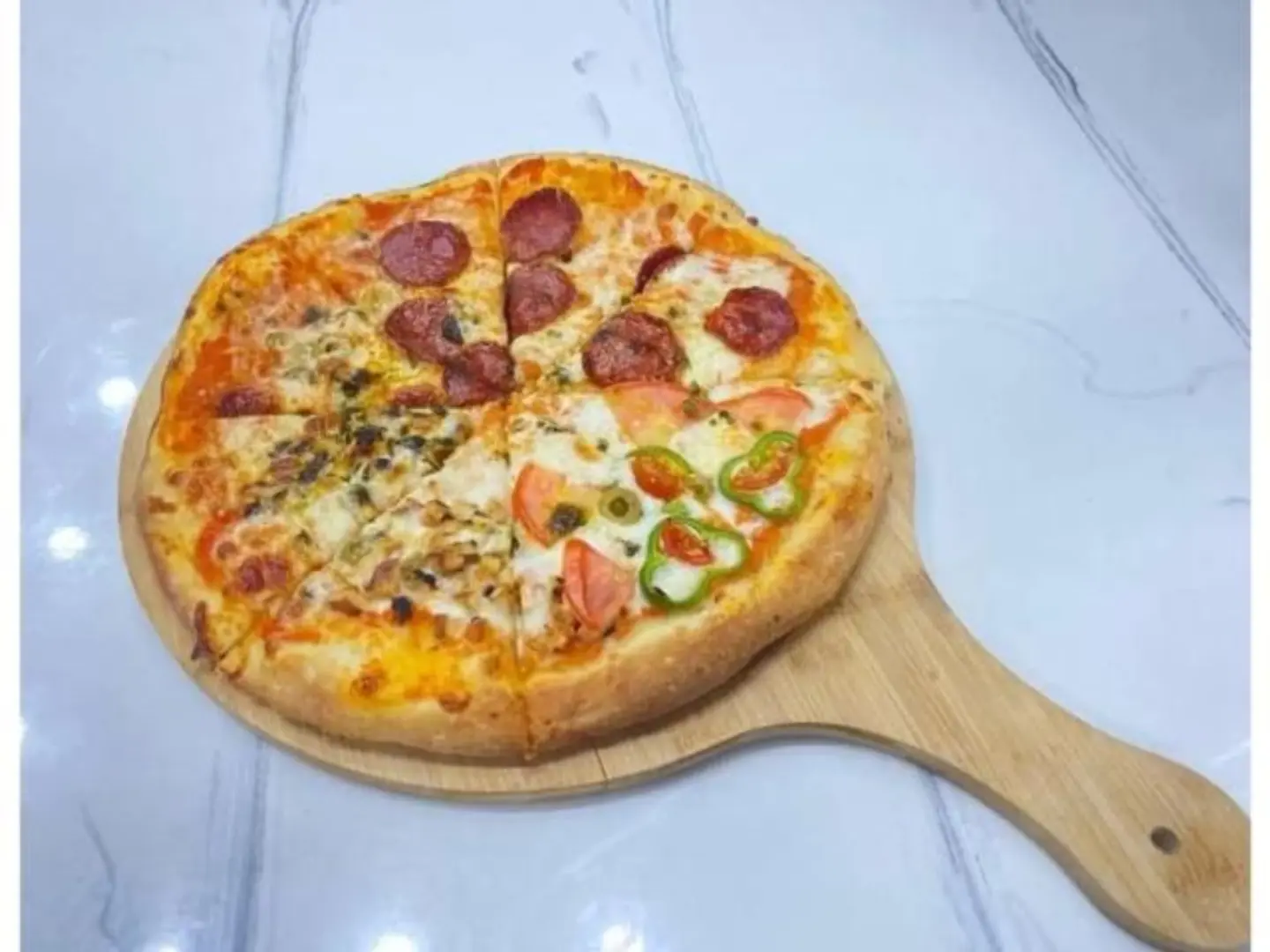 بيتزا الفصول الاربعة