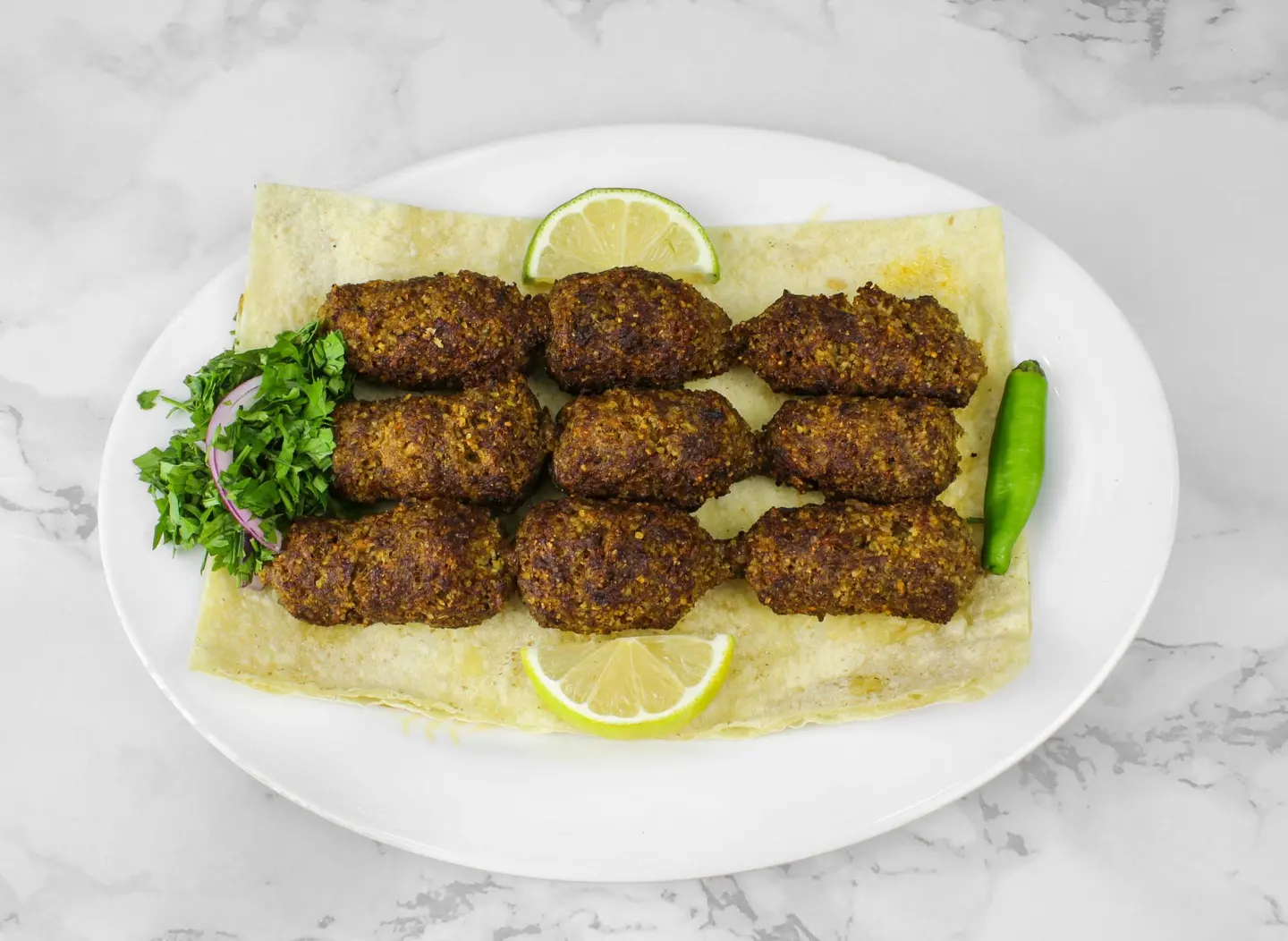 A For One Person Of Kibbeh On A Skewer