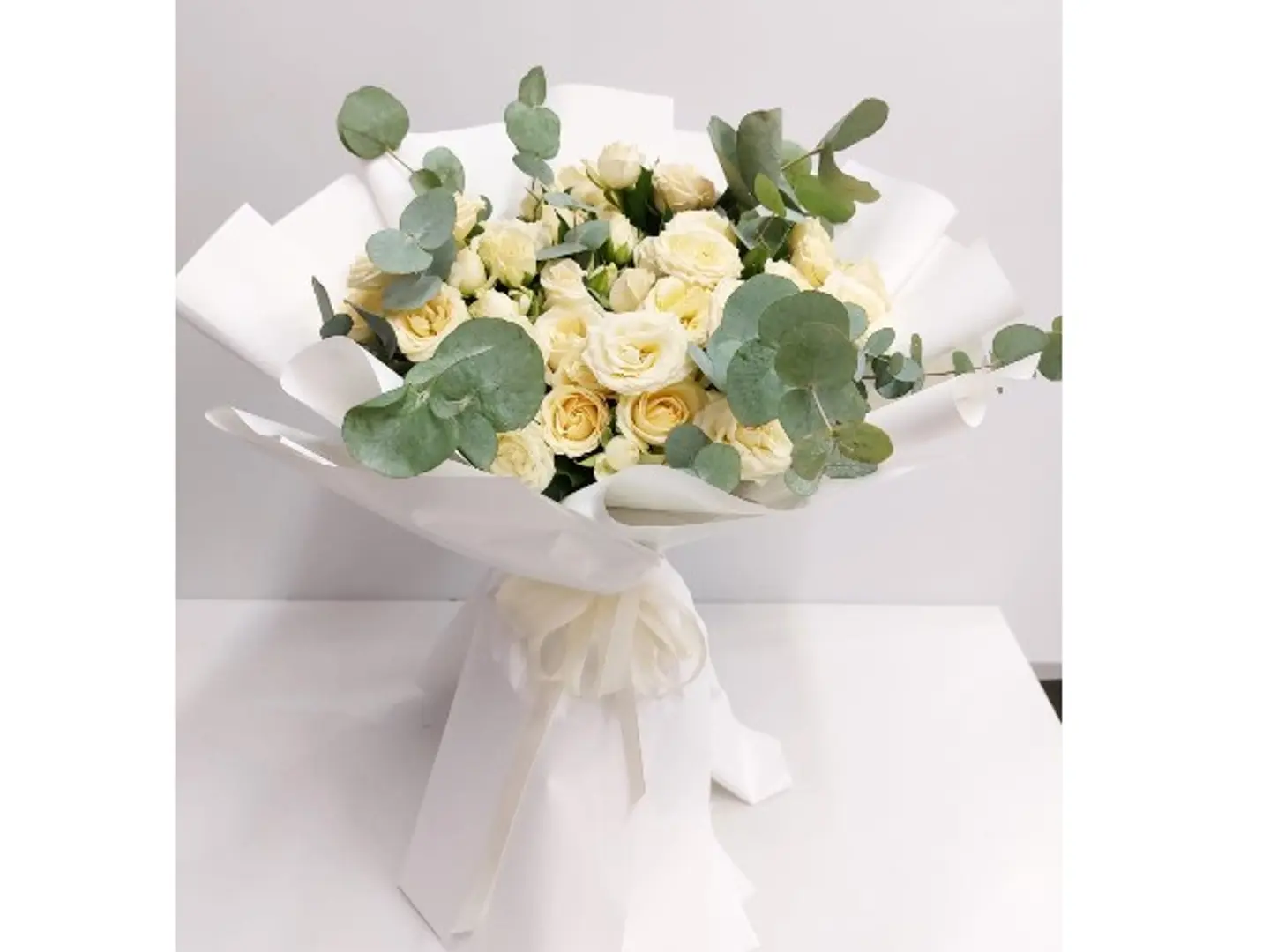 1025 Hand Bouqut Of 10 Baby Rose Of White And Eucalyptus