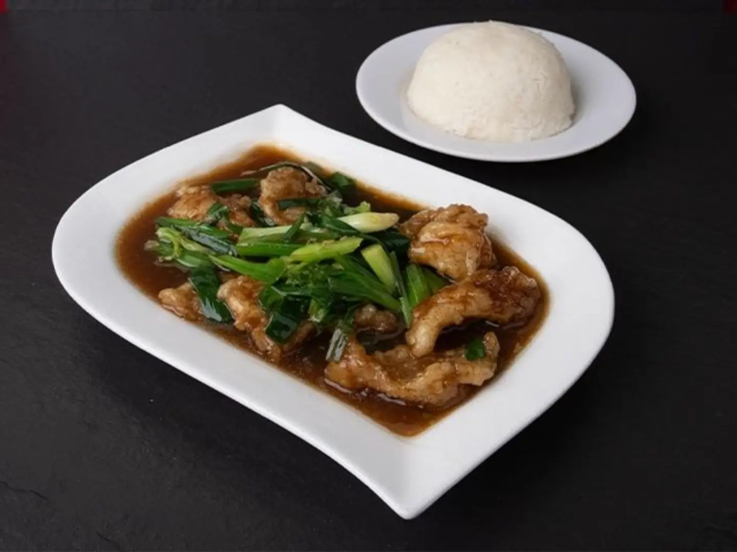 سمك بصل أخضر مع أرز