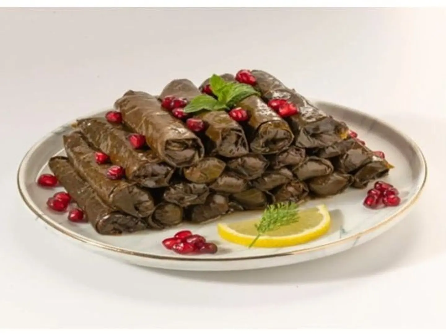 28 Grape Leaves With Pomegranate Molasses