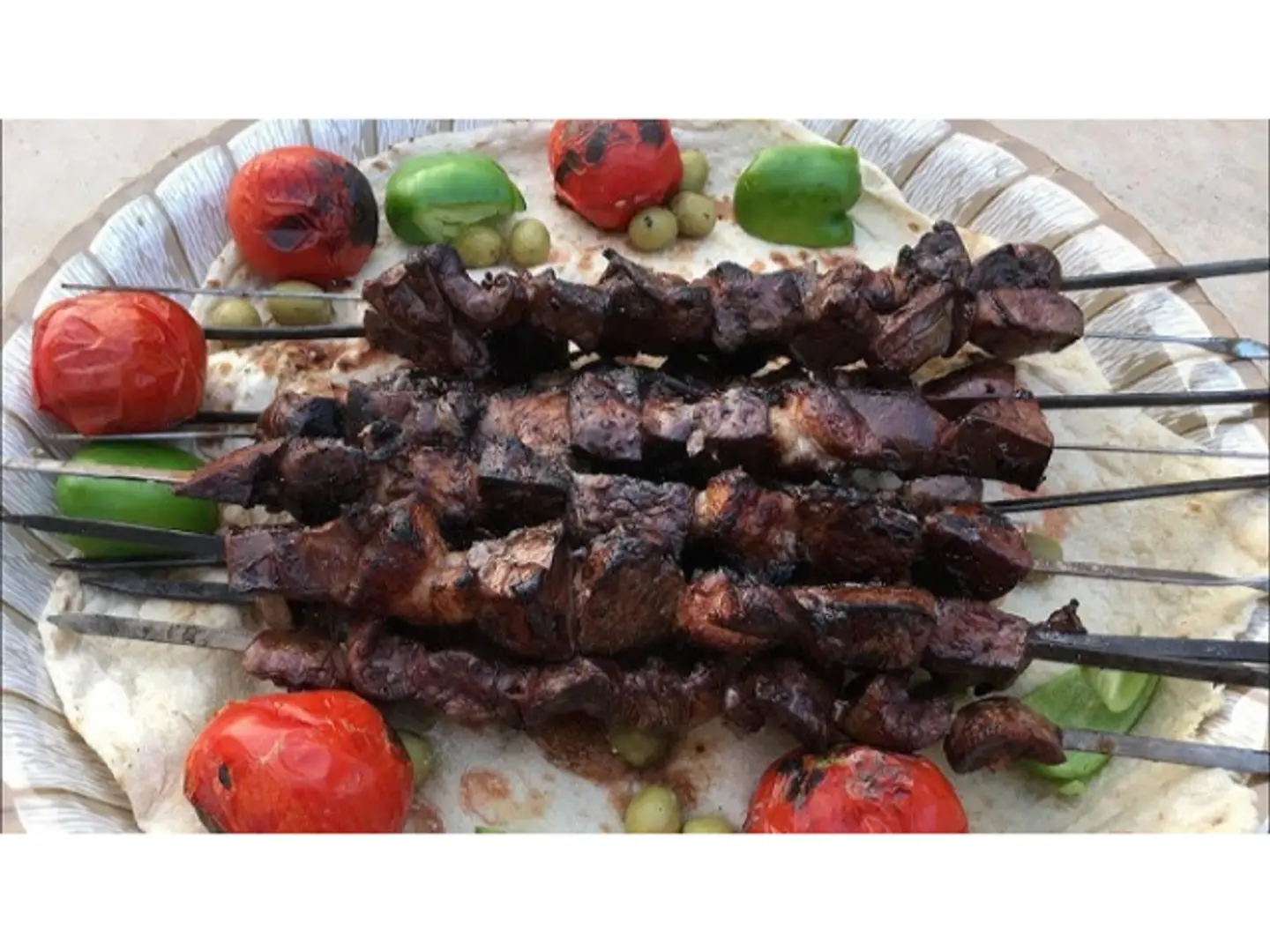 نصف كغ كبدة على فحم