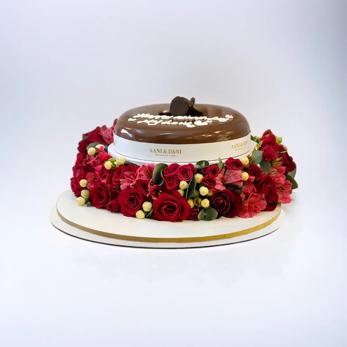 A Rose Arrangement With Chocolate Cake