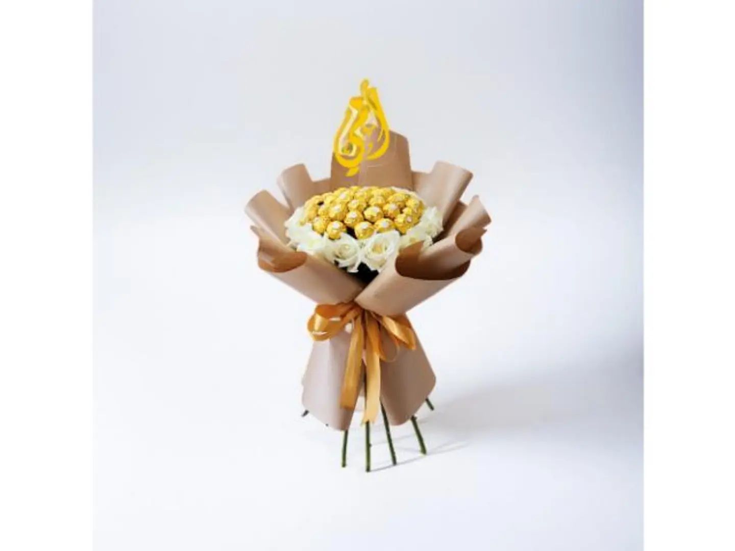 A Round Bouquet Of Roses With Chocolate Frills