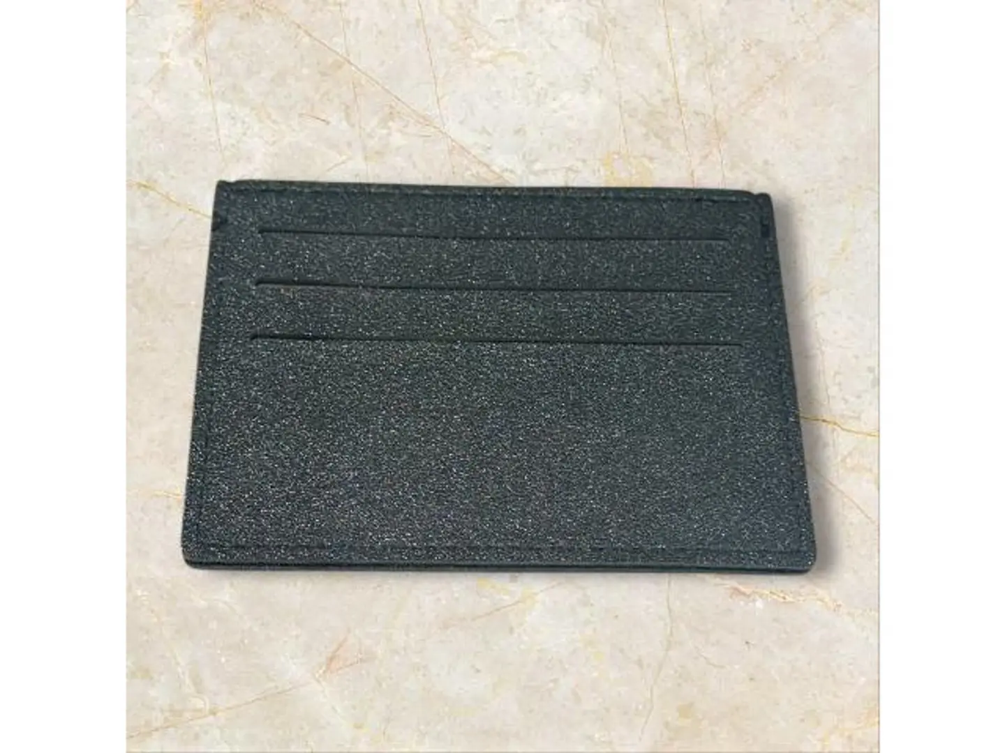 محفظه اسود جلد مع نحت الاسم