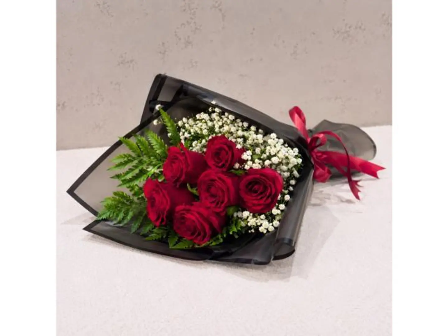 Red Flowers Buoquet With Black Wrapping